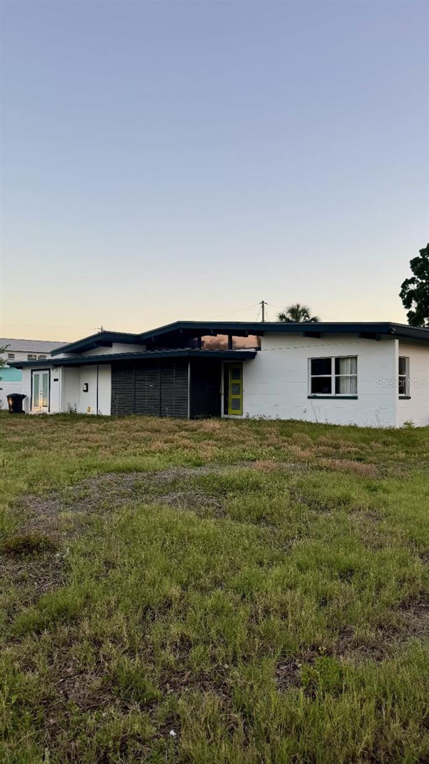 RARE DOUBLE LOT - CITY-APPROVED FOR 2 NEW BUILDS!

Exceptional redevelopment or restoration opportunity in Shore Acres, one of St. Petersburg’s fastest-growing waterfront neighborhoods. Situated on a rare 10,001 SF corner double lot, this property comes with written city approval for two new buildable lots, with buildable lot documentation available - creating a unique opportunity for investors, builders, or buyers looking to capitalize on the continued transformation of the area.

This property sustained flood damage during Hurricane Helene and is being sold AS-IS for land value, redevelopment, new construction, elevation, or complete renovation. For those with a vision for restoration, the existing home features striking midcentury modern architecture with incredible potential for renovation or a high-end flip.

Shore Acres is a golf cart-friendly waterfront community just minutes from vibrant downtown St. Petersburg. With significant redevelopment already underway and elevated new construction homes continuing to drive demand, this is an exceptional opportunity to secure two buildable lots in one of St. Pete’s most active redevelopment corridors.

CASH OFFERS ONLY. NO WHOLESALERS, ASSIGNABLE CONTRACTS, SUBJECT-TO OFFERS, OR INSPECTION CONTINGENCIES WILL BE CONSIDERED. Seller makes no warranties or representations regarding the condition of the property.