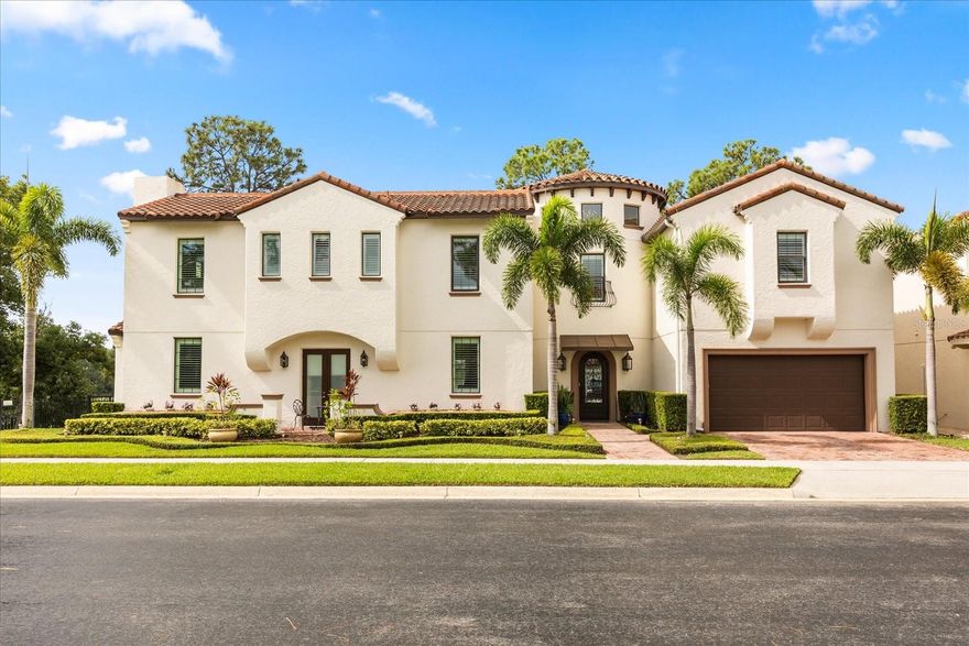 Where luxury meets lakefront living in beautiful Lake Mary! Welcome to your dream home — a custom-built lakefront masterpiece nestled between Banana Lake and Island Lake in one of Lake Mary most sought-after communities. This elegant 4,300+ sq ft. residence was designed to impress, combining timeless craftsmanship with modern upgrades and captivating waterfront views from nearly every room.
Step through the beautiful new steel front door into a soaring double-height foyer crowned by a dazzling cathedral chandelier, setting the tone for the sophistication that unfolds within. The gourmet kitchen is the centerpiece of the home—perfect for both chefs and entertainers—featuring exotic stone countertops, a 48” gas range, Sub-Zero appliances, custom cabinetry and an oversized island with built-in shelving.
The primary suite, located on the main floor, offers a private retreat with a luxurious spa bath and a custom-designed closet that feels like a boutique. Upstairs, a spacious loft and three oversized bedrooms provide comfort and privacy for family or guests. A media room sets the scene for movie nights and game days. Outdoors, you’ll find your personal sanctuary: a screened-in porch with a brand-new hot tub, outdoor kitchen and multiple seating areas perfect for dining or unwinding—all while taking in the unobstructed views of Island Lake, where breathtaking sunsets paint the sky. Recent updates include - new hot tub, new interior paint, garage floor epoxy, new steel front door, exterior brush/shrub clearing behind entire lot, new windows/glass doors.  Featuring natural gas, this home offers elegance without compromise. Located in the heart of Lake Mary, you’re just minutes from top-rated schools, the Colonial Town Park shopping district, fine dining and easy access to I-4, 417 and Orlando’s world-class attractions. Don’t miss this rare opportunity to own one of Lake Mary’s most exceptional lakefront estates—a true blend of sophistication, serenity, and Florida luxury living.