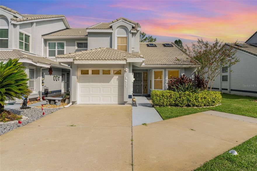 Welcome to this beautifully maintained 3/ 2.5 end-unit townhome located in the desirable La Cita golf course community. Offering 1,847 sq.ft. of living under air, home combines modern updates with comfort and style. Inside, you'll find wood-look tile flooring throughout the main living areas and vaulted ceilings that create a bright and open feel. The eat-in kitchen features newer appliances, while the spacious living area is enhanced by a custom-built entertainment center made with solid wood and granite. The primary suite is conveniently located downstairs and boasts a large shower, as well as a custom-organized walk-in closet. Upstairs, 2 additional bedrooms with carpet flooring. Enjoy peaceful views of the pond from the back sliding doors, or step outside on the patio surrounded by beautiful landscaping, also includes a 1-car garage, ample storage, and thoughtful upgrades throughout. Perfect for those seeking comfort, convenience, and scenic surroundings.