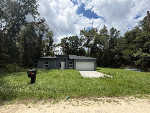 Photo of 13542 SW 114th Place, Dunnellon, FL 34432 (MLS # O6418883)