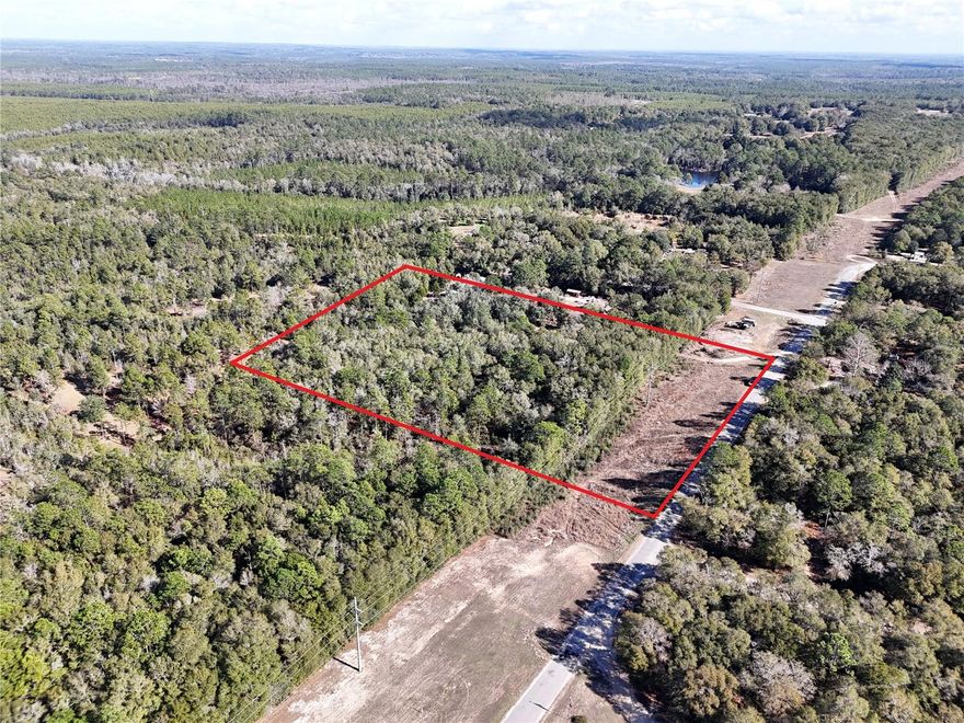 5.26-acre wooded lot. No HOA. Zoned for single-family residential use. Gas, electric, and water are available nearby for future connection; utilities are
not currently connected to the property. Property is located approximately 2 miles from downtown DeFuniak Springs, with access to shopping,
restaurants, and municipal services. Buyer to verify all information