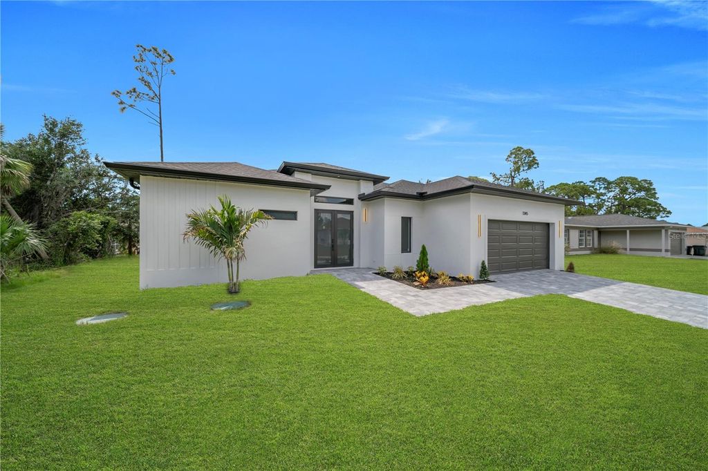 Photo of 1345 Ramrod St, North Port, FL 34287 (MLS # TB8511427)