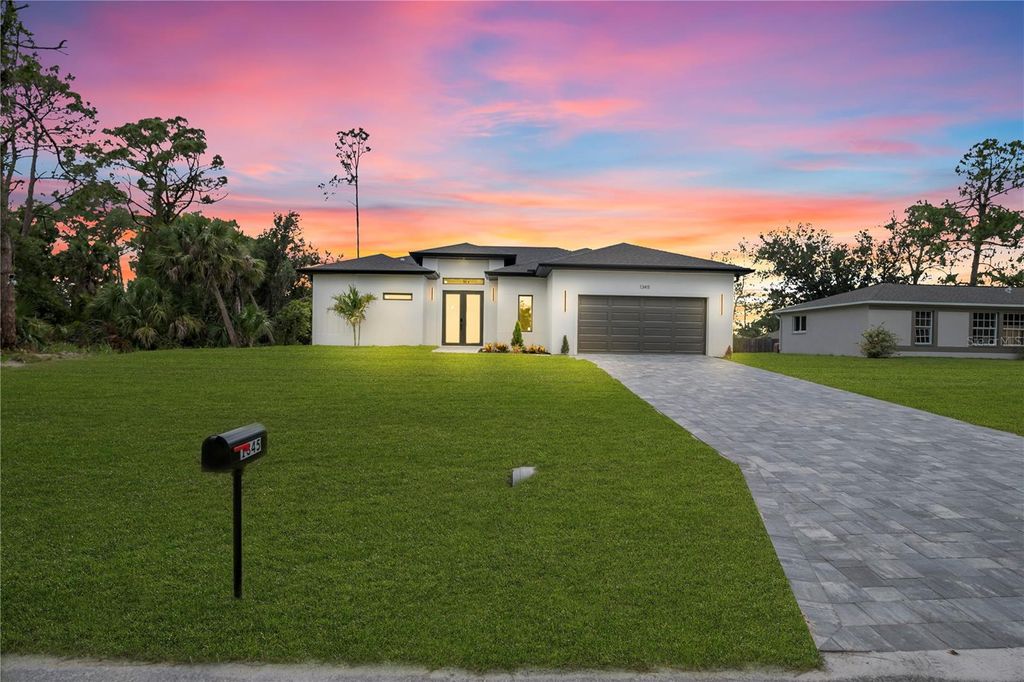 Photo of 1345 Ramrod St, North Port, FL 34287 (MLS # TB8511427)