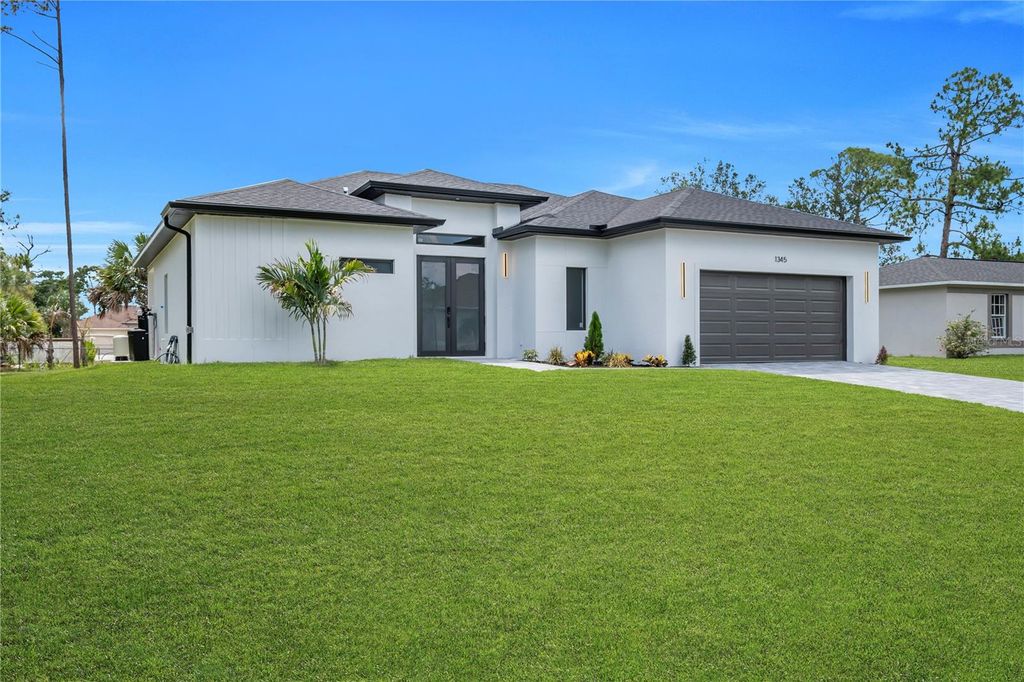 Photo of 1345 Ramrod St, North Port, FL 34287 (MLS # TB8511427)