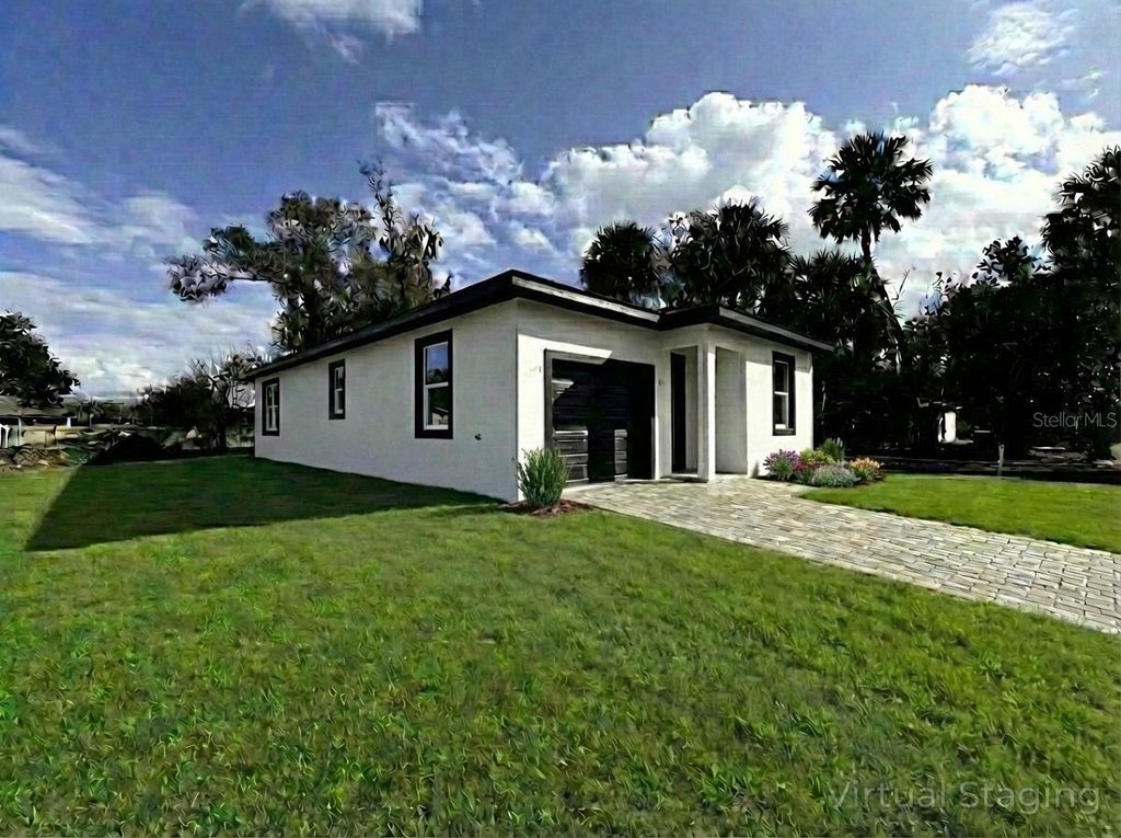 Photo of 1405 W 14th Street, Sanford, FL 32771 (MLS # O6385623)