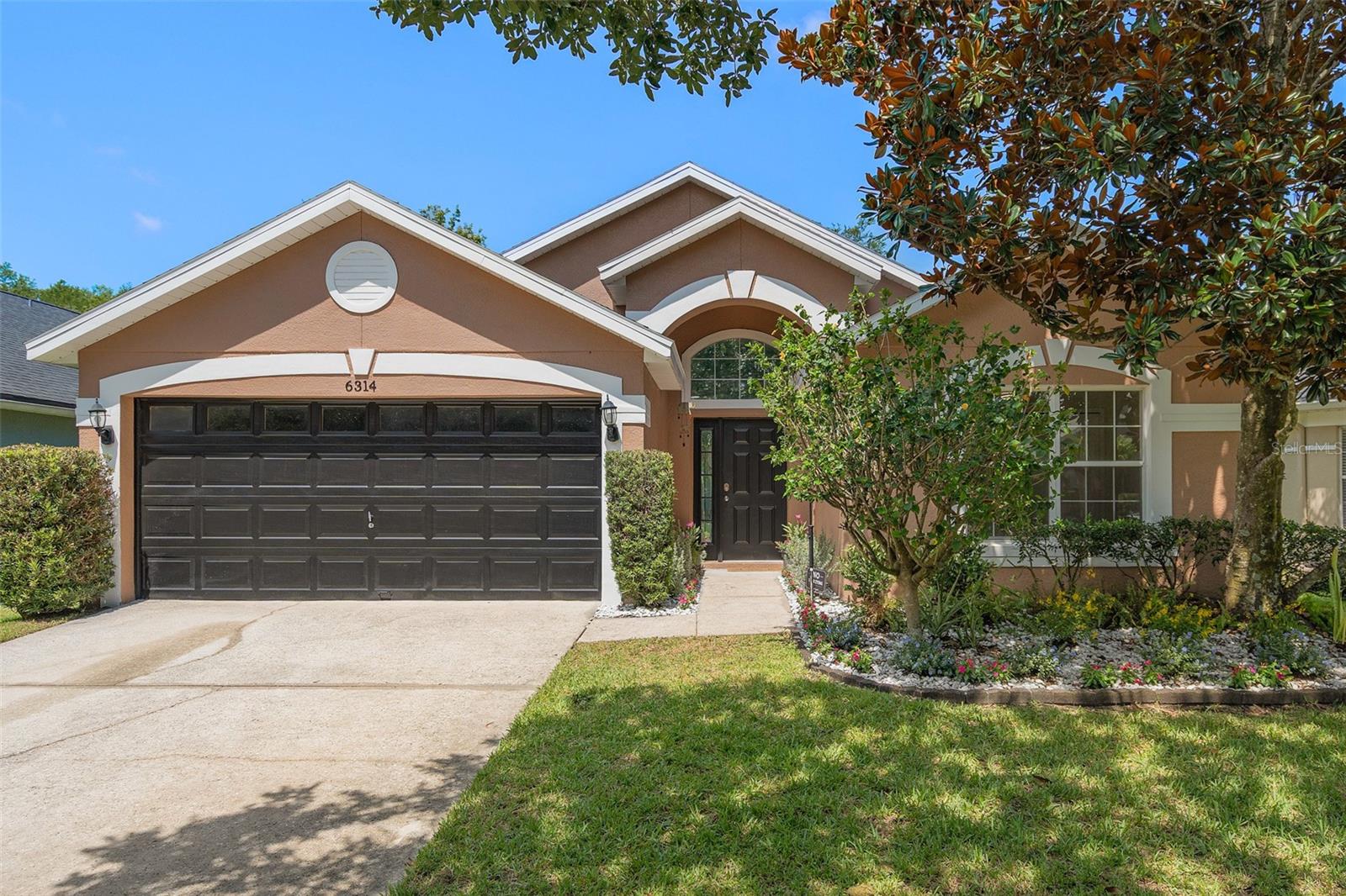One or more photo(s) has been virtually staged. Moving should feel like coming home — to the right place, the right vibe, and a seamless fresh start. This updated Vista Lakes home delivers it all! Nearly everything inside is new— quartz counters, soft-close cabinets, LED lighting, ceiling fans, luxury vinyl plank flooring, new interior Sherwin Williams paint, as well as all new Maytag appliances, except the fridge and washer/dryer, which are in good working order. Even the garage comes equipped with a brand new quiet powered Genie door opener with keypad and app access.
Step outside to a fully fenced yard with lush green grass, a charming paver patio, a small edible garden, and a beautiful mature oak offering generous shade. There's plenty of room to bring your dream pool to life and transform the yard into your ideal outdoor retreat. Even better — no rear neighbors! The house backs up to a peaceful and private wooded conservation area. For peace of mind, the home also has a newer roof, exterior has been recently painted with Sherwin Williams paint, and the HVAC has just been fully inspected and cleaned.
The highly desired Vista Lakes community is stacked with perks and offers residents a huge resort style pool with waterslide, a lap pool, and wading pool, miles of walking trails, playgrounds, fitness center, dog park, batting cages, baseball/softball field, basketball court, brand-new pickleball courts, and beautiful lakes with a fishing pier suitable for kayaking & paddle boarding. Rio Pinar Golf and Country Club extends the courtesy of social membership type privileges to all Vista Lakes' residents who will be able to access all the club social facilities with special Vista Lakes pricing along with use of the golf course at a preferred rate and times. This home is also a very short distance to a top-rated elementary and middle school, grocery stores, dining, and all the essentials. The best part… All this for a very low HOA fee of only $46/month!
Bonus: Seller is offering flexible concessions toward closing costs, a rate buy-down, or a home warranty. Qualified buyers may even be eligible for ZERO DOWN and a covered appraisal with the preferred lender. This isn’t just a house — it’s a fresh start made easy. Let’s schedule your new home tour today.
