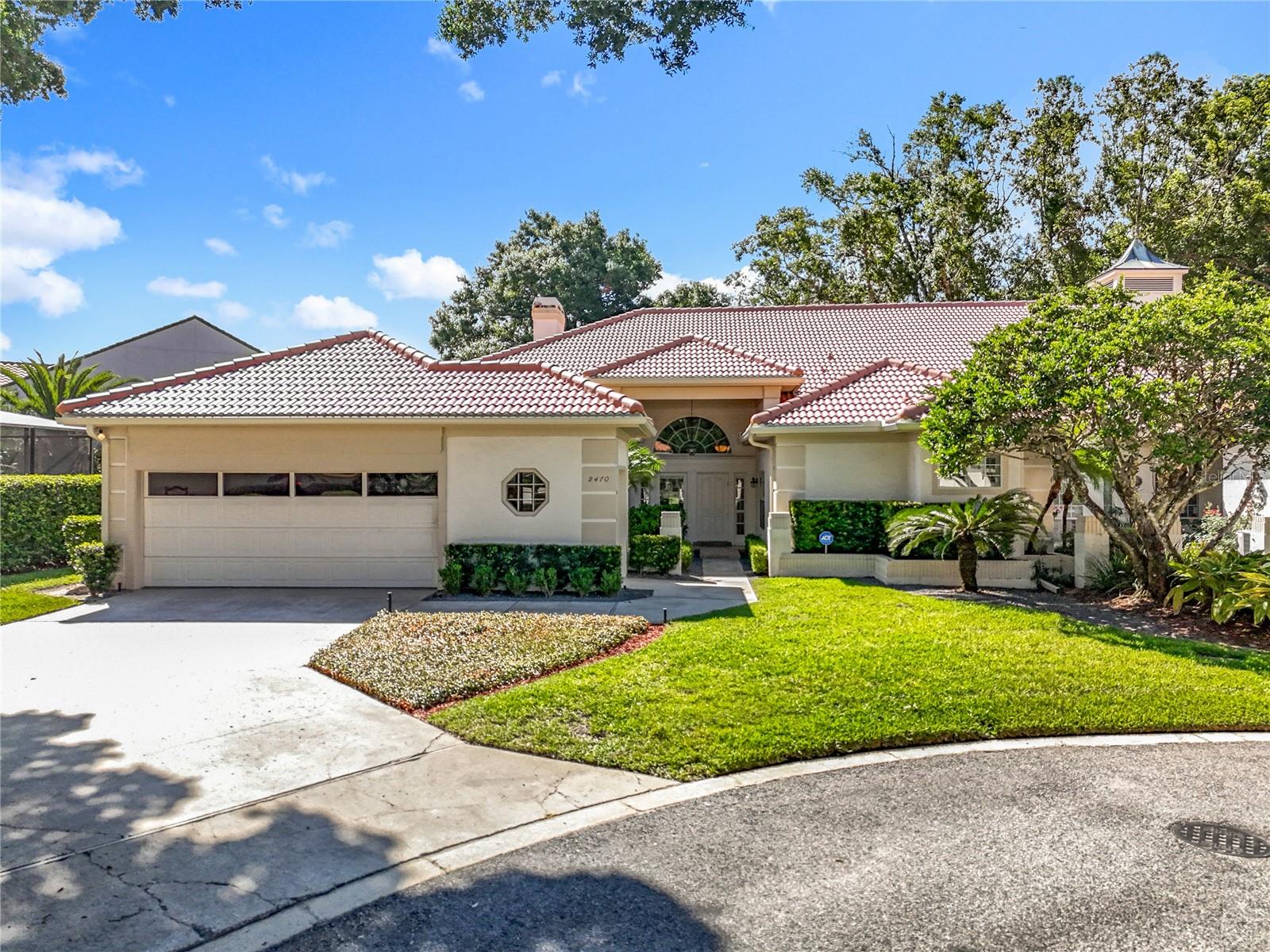 Nestled among the Majestic Oak Trees and Golf Course is a Picture Perfect Setting in the Highly Sought after “Les Chateaux at Sweetwater” Community consisting of 20 French Inspired Private Residences. This IMMACULATE and MODERN ONE STORY END UNIT Golf Villa is Directly on Sweetwater Country Club's Golf Course with EXPANSIVE LONG VIEWS of Hole #1 Green and Fairway. A Lush Manicured Private Courtyard with Large Tiled Entryway and NEW BARREL TILE ROOF ($60K - Jan. 2025) are Ready to Welcome You. This Highly Desirable “Monet” Model features HARDWOOD FLOORS, KNOCKDOWN TEXTURED (Not Popcorn) Ceilings and Walls throughout. Perfect for Entertaining this Beautiful Home Showcases HIGH VAULTED Ceilings in the Combination Golf-Front Living / Dining Rooms with Custom Built-in Cabinetry, Fireplace, Wet Bar, and Wall of French Doors that open up to the Large Tree Canopied Rear Patio Lanai. Running the ENTIRE LENGTH of the Villa (58 FT.) the Rear Screened Patio Lanai with Cedar Ceiling and Updated Tiled Floor is the Perfect Spot for your Morning Coffee, Al Fresco Dining or just Watching Golfers go by. Surrounded by Natural Light this OPEN and AIRY Floor Plan features a Spacious Custom Designed Gourmet Kitchen with Loads of IMPORTED Cuisines Laurier All-Wood Cabinetry, Granite Countertops, GE Monogram, GE Profile, Bosch Stainless Steel Appliances, 50+ Bottle Wine Chiller with Adjoining Golf Front Breakfast / Family Room. This 3 Way Split Plan with 3 ENSUITE BEDROOMS and 3 FULL BATHS offers additional Family and Guest Privacy. Relax and Retreat to the Oversized Primary Suite with Stunning Golf Course Views and Rear Patio Lanai Access. The recently renovated Spa-Inspired Primary Bathroom features a Soothing Garden Soaking Tub, Marble-Tiled Curbless Entry Walk-In Shower, 2 Separate Custom Sink Vanities with Quartz Countertops and 1 with Make-Up Vanity, 2 Spacious Walk-in Closets, and 2 Extra Large Linen/Storage Closets. Oversized 2 Car Garage complete with Garage Door Windows for natural light, Separate Golf Cart Garage Door and Cart Storage Area, Expansive Wall of Storage Cabinets, and Extra Refrigerator. Maintenance free lawn and exterior pest services maintained by Association. Residents of the Exclusive Sweetwater Community have access to Sweetwater’s Private Lake Brantley Beaches, Boat Ramp, Sweetwater Oaks Tennis Courts, Playground Area and more. A Short Walk or Cart Ride to Sweetwater Country Clubhouse.
Call for your EASY SHOWING today!