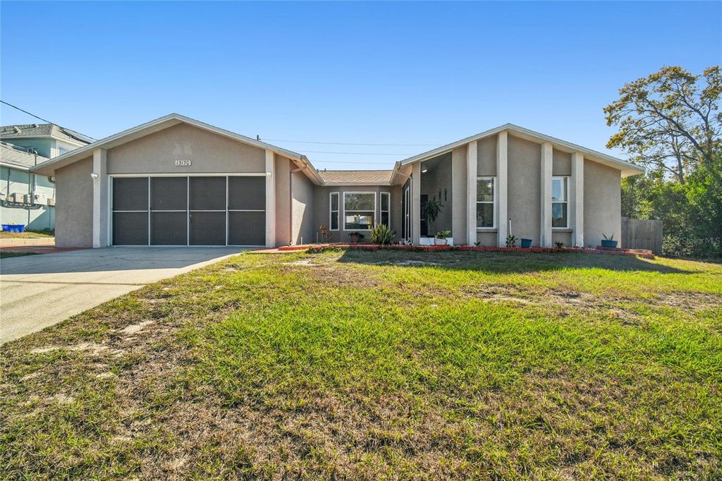 Photo of 13170 Pirate Lane, Spring Hill, FL 34609 (MLS # TB8459524)