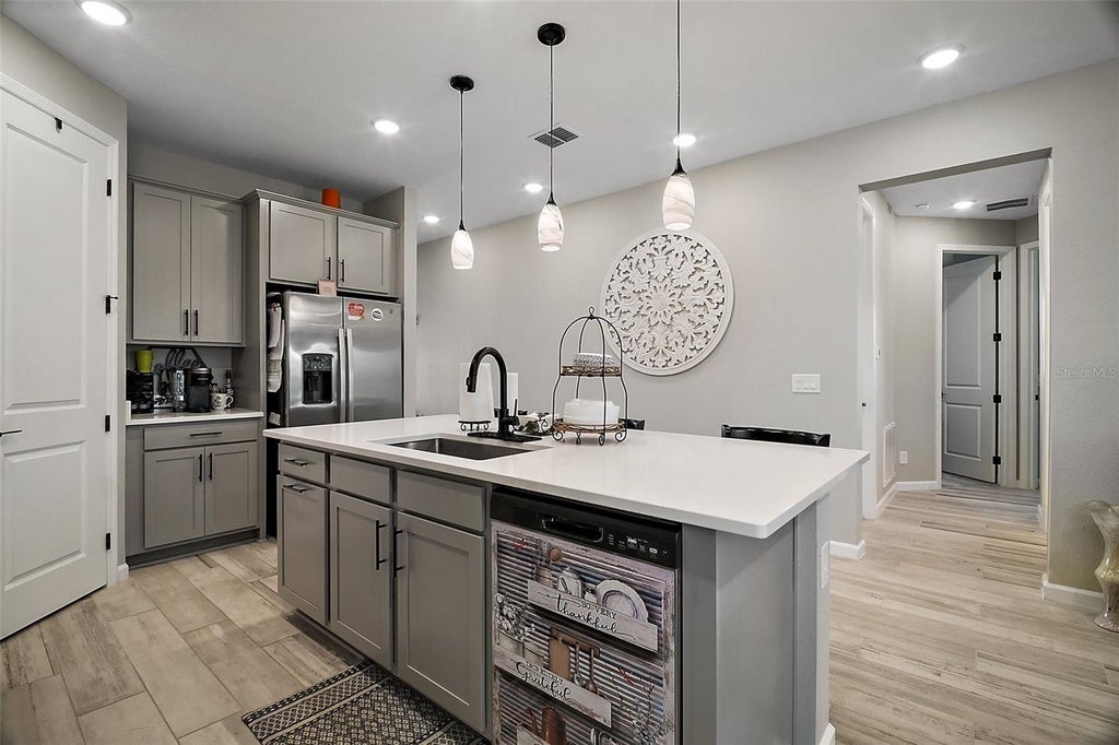 Photo of 2451 Spring Breeze Drive, Leesburg, FL 34748 (MLS # O6429765)