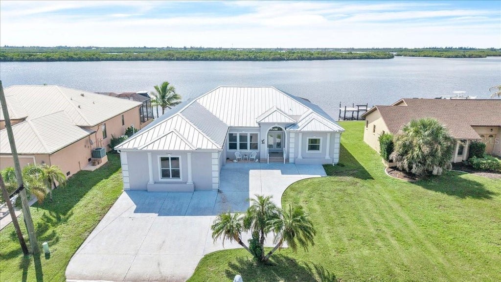 Photo of 3772 Peace River Drive, Punta Gorda, FL 33983 (MLS # C7530703)