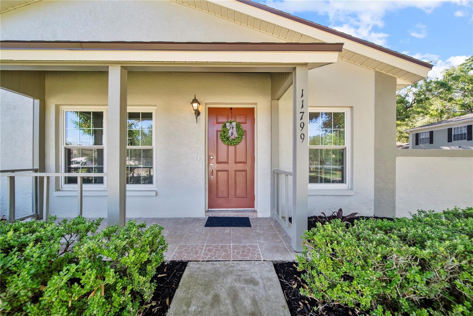 Welcome to the highly desired community of Raintree Manors. Featuring 1,272 heated square feet which includes 2 large ensuites bedrooms one upstairs & one downstairs, each with their own bathroom and walk in closets. The home has just been updated with luxury plank vinyl flooring added seamlessly throughout the entire home. A brand new white kitchen with granite counters, LED lighting and a Brand New Stainless Steel Appliance package has just been completed. A one car attached garage with a new garage door & opener, 2024 Water Heater, 2024 Electrical Panel, 2025 HVAC & ductwork, 2025 Roof; In 2024 the Garage side of building was completely redone to the studs on the second floor. Second floor decking, insulation, drywall, texture, exterior/stucco, paint inside/out, new upstairs windows, electrical, lighting and bathroom completely rebuilt/remodeled. As the community manager has said "this building is the best built & most updated building in the entire community!" Located right across the street from all of the communities' amenities which includes a clubhouse, covered patio with seating, 2 newly renovated pools & tennis courts. Raintree Manors is located close to shops and restaurants, USF, FC and only 20 minutes from downtown Tampa, Armature Works and the Tampa Riverwalk. This home is ready for you to call it your own! Call today for a list of all of the updates and to view this amazing opportunity!