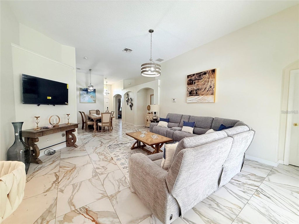 Photo of 2213 Wyndham Palms Way, Kissimmee, FL 34747 (MLS # O6450730)
