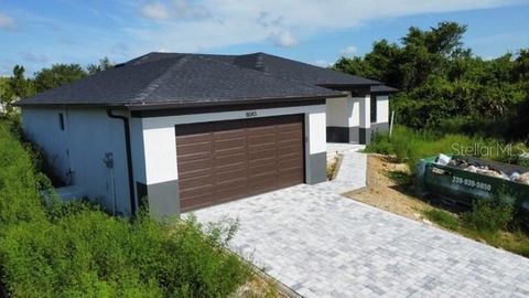 Photo of 8043 Walbert Street, Port Charlotte, FL 33981 (MLS # R4909957)