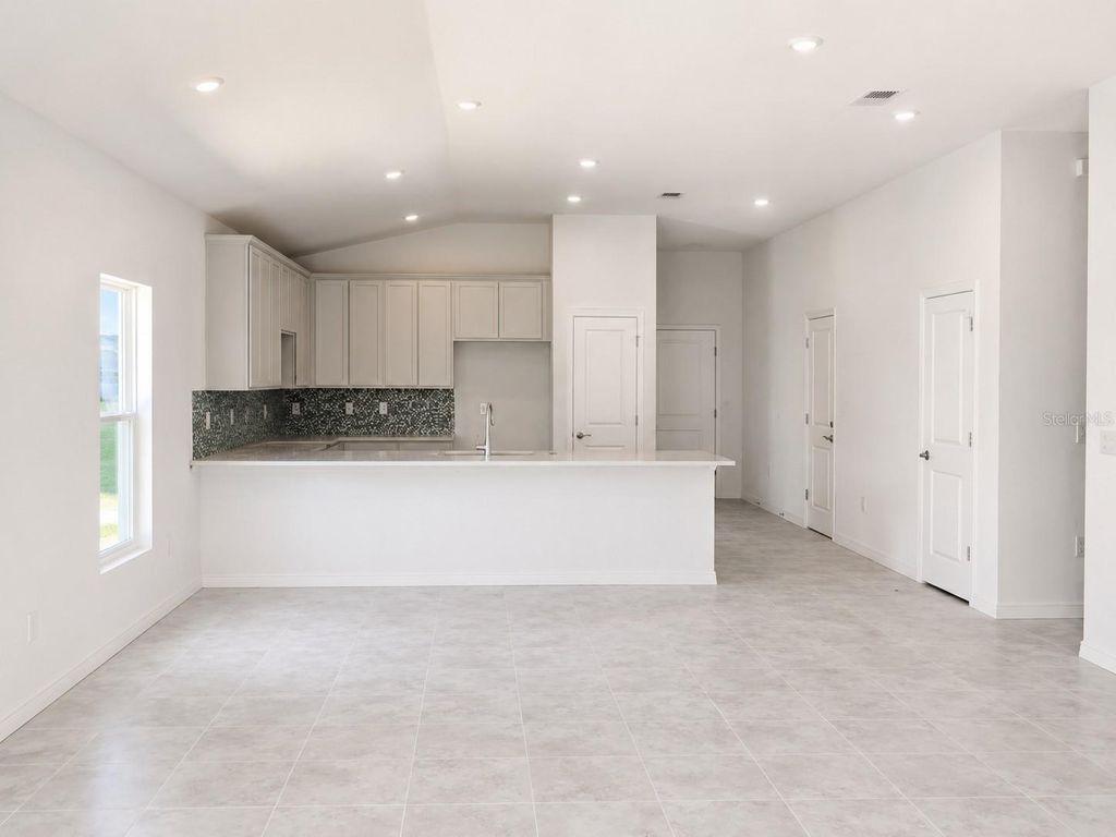 Photo of 434 Albatross Road, Rotonda West, FL 33947 (MLS # O6411925)