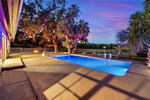 Photo of 36245 E Spring Lake Boulevard, Fruitland Park, FL 34731 (MLS # O6452487)