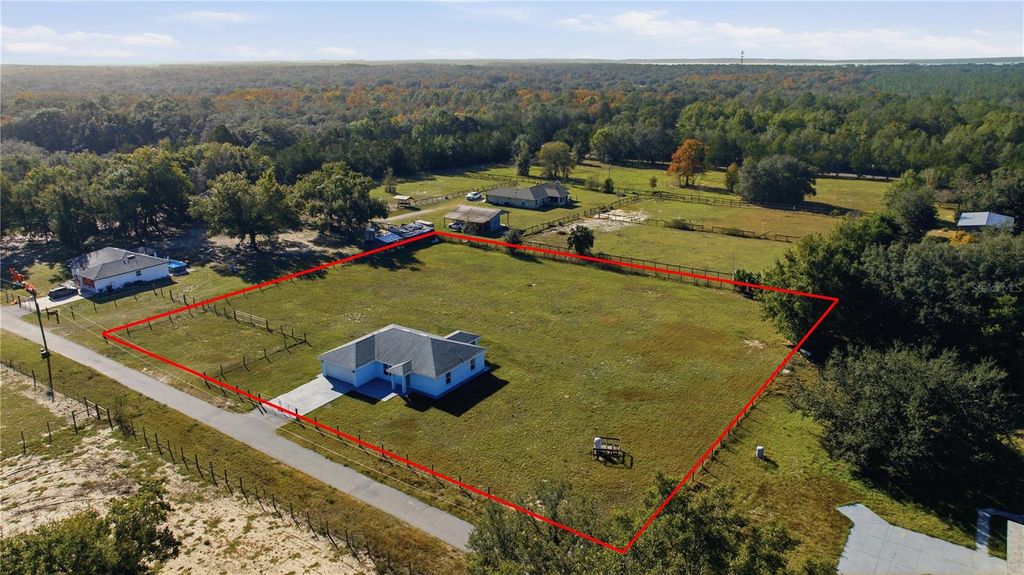 Photo of 10758 SE Highway 464c, Ocklawaha, FL 32179 (MLS # OM715505)