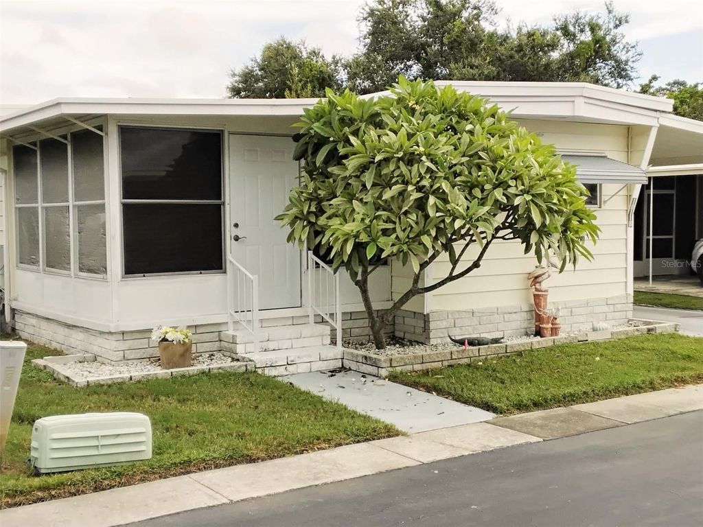 Photo of 10118 N Lake Drive #30, Largo, FL 33773 (MLS # TB8418837)