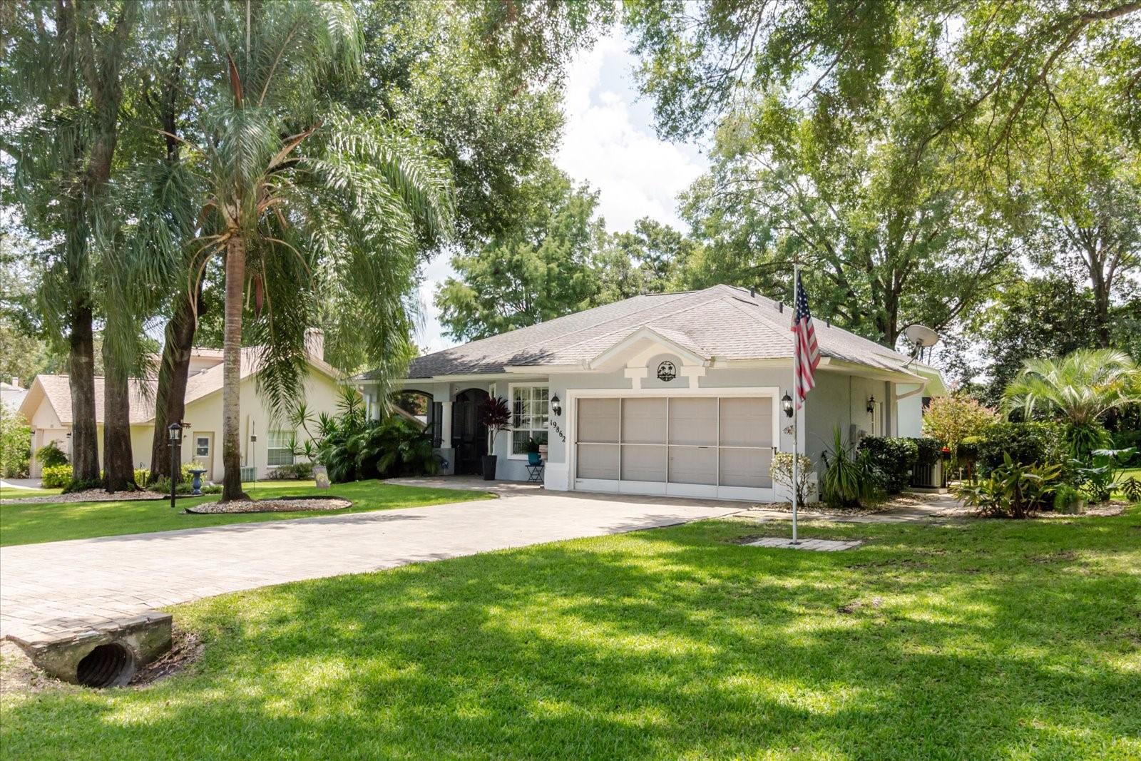 Welcome to your dream home in the highly sought-after Rainbow Springs neighborhood inside Dunnellonl! Nestled on a spacious ¼-acre lot, this beautifully designed 3-bedroom, 2-bathroom residence offers the perfect blend of luxury, functionality, and modern comfort.
Step inside to an open-concept layout featuring a gourmet kitchen complete with sleek modern cabinetry, granite countertops, and high-end stainless steel appliances—perfect for entertaining or creating culinary masterpieces. The expansive living areas are filled with natural light and designed for both everyday living and hosting. This home offers a spacious kitchen with an eating area, a full coffee bar, and a kitchen island.
Retreat to the spacious master suite, which boasts a walk-in closet and a spa-like ensuite bathroom with dual vanities and luxurious finishes.
The home features an in-ground pool with salt/solar heating, a covered lanai with privacy screening, and a screened in front porch with beautifully landscaped yard with irrigation, oversized garage has lots of storage, and the driveway has been upgraded with pavers. The HVAC system was replaced in 2019.
Enjoy low property taxes and minimal HOA fees, while also taking advantage of the community’s impressive amenities: community pool, restaurant, workout room, pool tables, pickleball, tennis courts, bike trails and walking trails and easy access to Rainbow River.
Conveniently located near lots of shopping, this home truly has it all.
Don't miss the immersive 3D Matterport tour to explore every inch of this incredible home!