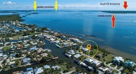 Photo of 3420 1st Avenue, St James City, FL 33956 (MLS # C7523384)