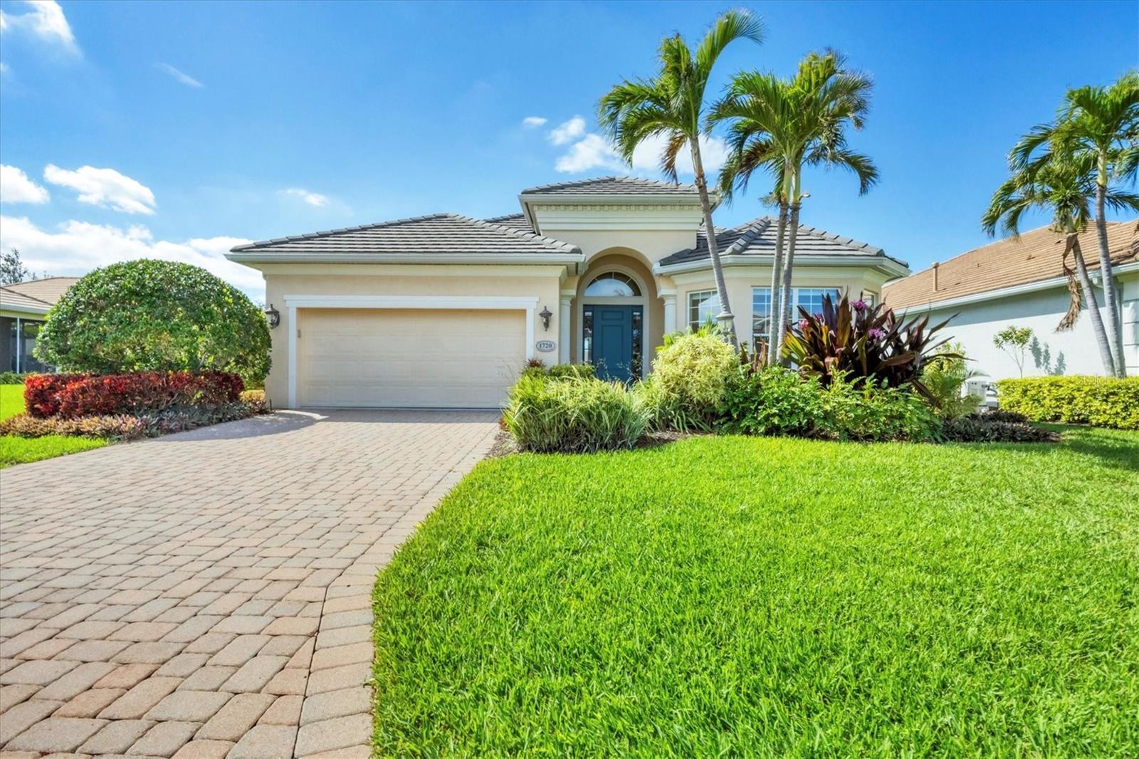 Welcome to Wisteria Park! Tucked away in the most desirable part of Northwest Bradenton, this lushly manicured community is home to this beautiful residence—a Pat Neal Roanoke floor plan. This delightful home features vanishing 8 ft sliding glass doors that seamlessly blend indoor and outdoor living on the extended patio. The tile roof ensures both style and durability, while tranquil lake views can be enjoyed from the living room and primary bedroom. The versatile third bedroom is designed to function as a den, office, or an additional bedroom, complete with an ensuite bath. Lofty 12 ft ceilings enhance the spacious and airy feel of the home. Proudly maintained by a single owner and never rented, this home remains in pristine condition. Embrace the true Florida lifestyle with the oversized screened patio, perfect for watching herons, egrets, and cormorants from your lakeside retreat. Plus, this home is located just a short bike ride from Robinson Preserve, a pre-eminent nature preserve on the bay where you can bike, hike numerous trails, or kayak. To top it all off you are just minutes away from the powder-soft beaches of Anna Maria. Room dimensions are approximate and should be verified by buyer/agent.