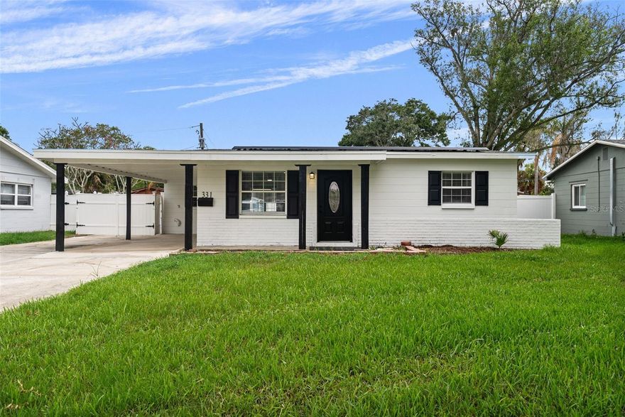 Charming 2 bedroom, 1 bath single family home for sale in the Rio Vista neighborhood of North St. Petersburg! This renovated home is conveniently located minutes off the Gandy Bridge and a short drive to both downtown St. Petersburg, Tampa, the Selmon Expressway, and plentiful shopping and entertainment options off 4th Street Inside, this cozy home has been updated with new Ceramic tile flooring and a complete kitchen renovation featuring new stainless steel appliances, white Corian countertops, and all new cabinets. Inside you will also find two bedrooms, an updated full bathroom with shower, and a laundry room with storage space and a GE washer/dryer combo. The back of the home also features a light filled Florida room/rear porch area that is screened in and overlooking the expansive backyard. Other notable interior features and upgrades include the following: newer breaker panel with a Tesla solar system installed (Sell power back to the Electric Co!), all new plumbing, new front door and carport door replaced to meet hurricane specifications, all windows replaced with Window World windows, fresh paint inside and out, all interior doors recently replaced, new front yard irrigation system and new AC unit. This large 60 by 120 lot has an oversized, fenced backyard with plenty of room to put in a pool or for endless entertaining options. The driveway has also been extended to the rear of the home, allowing for parking of a large RV or boat.
