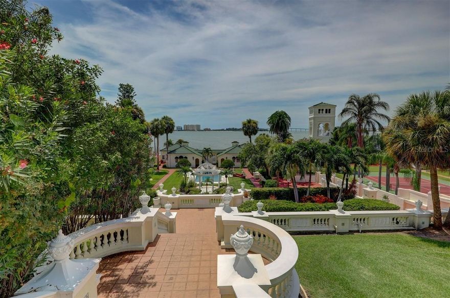 THE SOUTH HOUSE,  ALSO KNOWN INTERCHANGEABLY AS THE CARD HOUSE OF THE FABLED, HISTORIC & LEGENDARY CENTURY OAKS ESTATE SITED WITHIN THE HARBOR OAKS ENCLAVE OF DOWNTOWN CLEARWATER’S CORE ON FLORIDA’S WEST GULF COAST. Unique to say the least,  the property presents an unheard of opportunity to build the modern day manse of your desire atop an ELEVATED 50 FOOT BLUFF OFFERING THE WIDEST MARGINS OF UNABATED CLEARWATER HARBOR, GULF OF AMERICA,  CLEARWATER BEACH AND SOUND VIEWS that will resonate within your sight and senses. Rare, by any estimation is the current 3 bedroom and 3 bath 3,000 square foot structure- (currently undergoing some refurbishment post storms) poised at the Harbor’s Edge, on what is the deepest segment of Clearwater’s Harbor. This very structure may serve as your family’s guest home accommodating the yachtsmen, sportsmen and  recreational enthusiasts near and dear to your cause. Now, for the EXTRAORDINARY, this site possesses its own gate, MEGA DOCKAGE, AND IS SEPARATED FROM THE REST OF THE ESTATE. IMAGINE WESTERN SUNSETS, A LEGACY LOCALE, A NON EVACUATION ZONE, NO FLOOD INSURANCE, ALMOST ANY SIZE BOATING, AND A 20 MINUTE COMMUTE TO TAMPA’S INTERNATIONAL AIRPORT. I leave the decision in your well balanced hands.