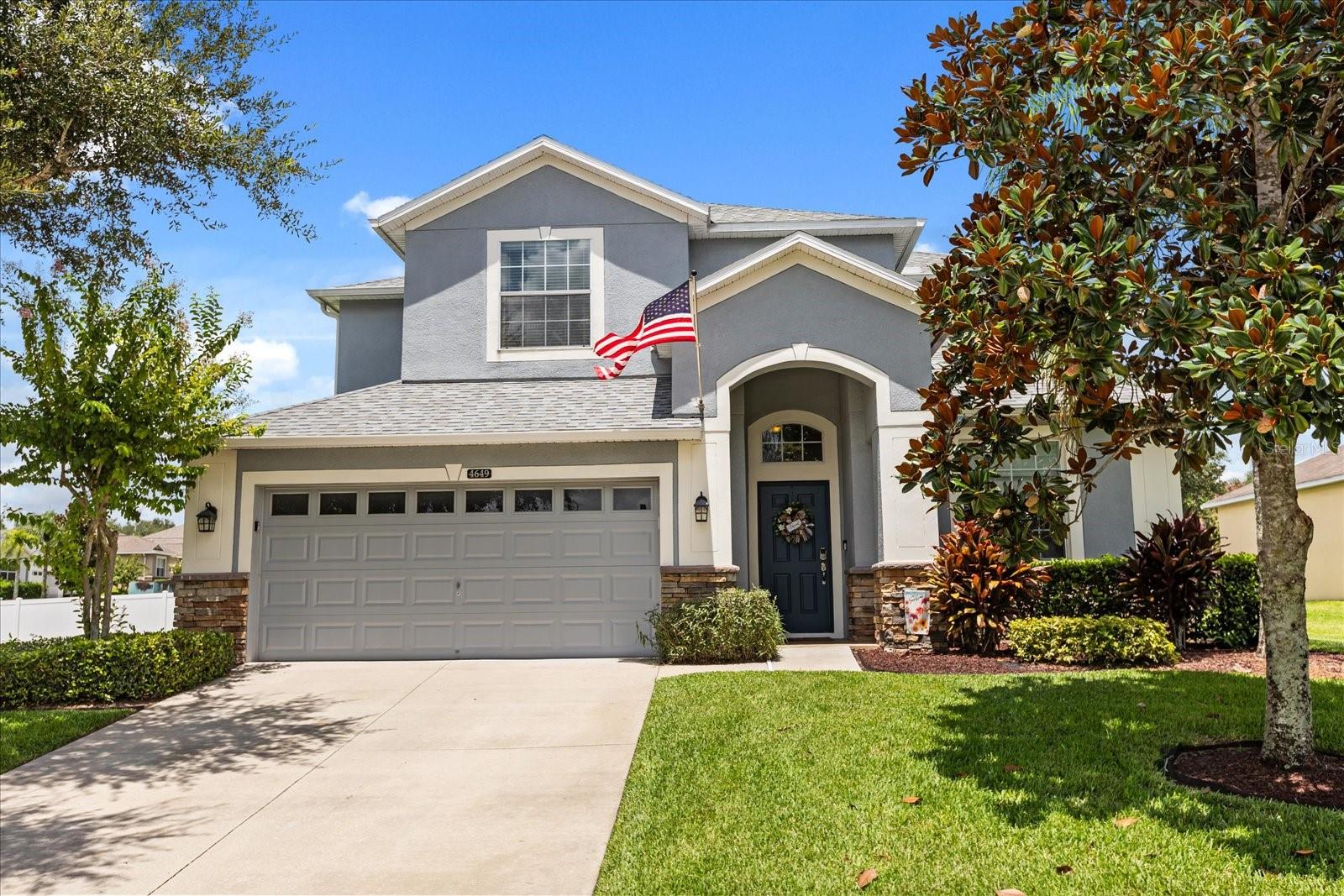 Welcome to this stunning 5-bedroom, 3-bathroom two-story home located in the Stoneybrook Hills community—just minutes from historic downtown Mount Dora, major highways, top-rated restaurants, and everyday amenities.
Situated on a corner oversized lot with a private mailbox, this beautifully upgraded home offers endless interior and exterior features! Step inside to find rounded corners throughout, new luxury vinyl plank flooring that is waterproof and scratch-resistant with a lifetime warranty, new carpet, and an electric fireplace in the living room. The kitchen showcases granite countertops, freshly painted cabinets, and stainless steel LG appliances that are less than a year old.
The primary suite features two walk-in closets and a newly renovated spa-like bathroom with dual sinks, soft-close cabinetry, a soaker tub, open glass shower with waterfall shower head, ceramic tile, private water closet, and a stylish bi-fold barn door oversized linen closet. Both the primary bedroom and living room are equipped with remote-controlled automated blinds.
Additional highlights include a laundry room with built-in shelving, ceiling fans in all bedrooms, a versatile upstairs loft with bonus room, and recent updates such as a 2024 80 GAL ENERGY EFFICIENT WATER HEATER, 2023 ROOF, and 2021 HVAC with dehumidifier. This home is also energy efficient with 58 HERs Rating. Outside, enjoy a fully fenced yard with a playground set on rubber mulch, a paved 30x12 extension in backyard poured 6 inches deep—ready for future builds and a grilling gazebo perfect for entertaining. The 3-car tandem garage includes garage shelving, and a new opener.
Located within a gated community with 24/7 guard, Stoneybrook Hills offers a variety of resort-style amenities, including a pool, fitness center, basketball and tennis courts, playgrounds, and private roads.
Don’t miss the opportunity to own this impeccably maintained and thoughtfully upgraded home in one of Central Florida’s most desirable communities!