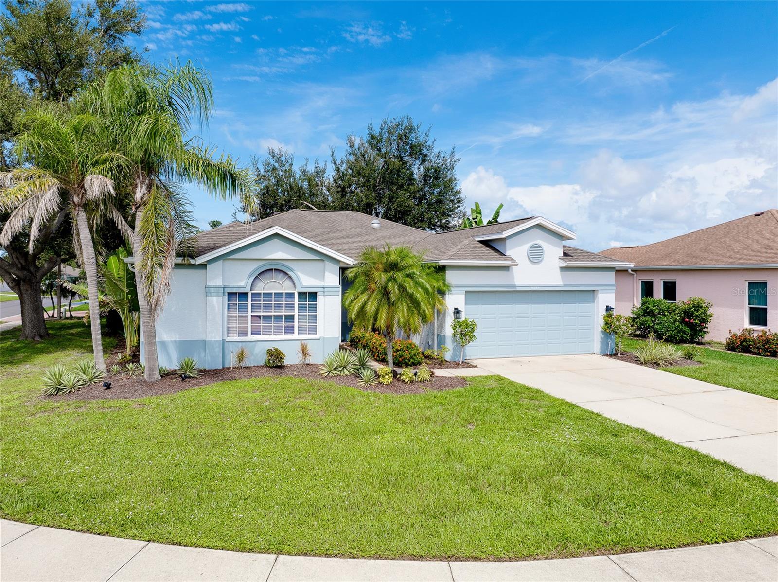 Welcome to 4342 Manfield Drive, a beautifully updated, move-in ready home located in the highly desirable community of Woodmere Lakes. With LOW HOAs and NO CDD, this quaint neighborhood offers comfort, safety and convenience that is affordable. This meticulously maintained 3 bedroom, 2 bath POOL home is available just in time to enjoy southwest Florida living. This home is filled with sunshine and boasts an open floor plan featuring a HUGE chef's kitchen that is open to the main dining and living room areas. The primary bedroom is spacious and has storage galore with an enormous walk-in closet and built in storage closets. The primary bath is updated and has a “spa like” feel. Across the home, there are an additional 2 generously sized bedrooms that share another full bath. Recent upgrades include fresh paint and luxury vinyl flooring throughout, contemporary lighting fixtures and a gorgeous Travertine paver pool deck & lanai. The ideal location of this home provides convenient access to breathtaking Gulf beaches, historic downtown Venice’s shopping & restaurants, Wellen Park, the new Atlanta Braves spring training stadium and campus as well as quick access to I-75. Take advantage of this incredible opportunity to own this amazing property today!