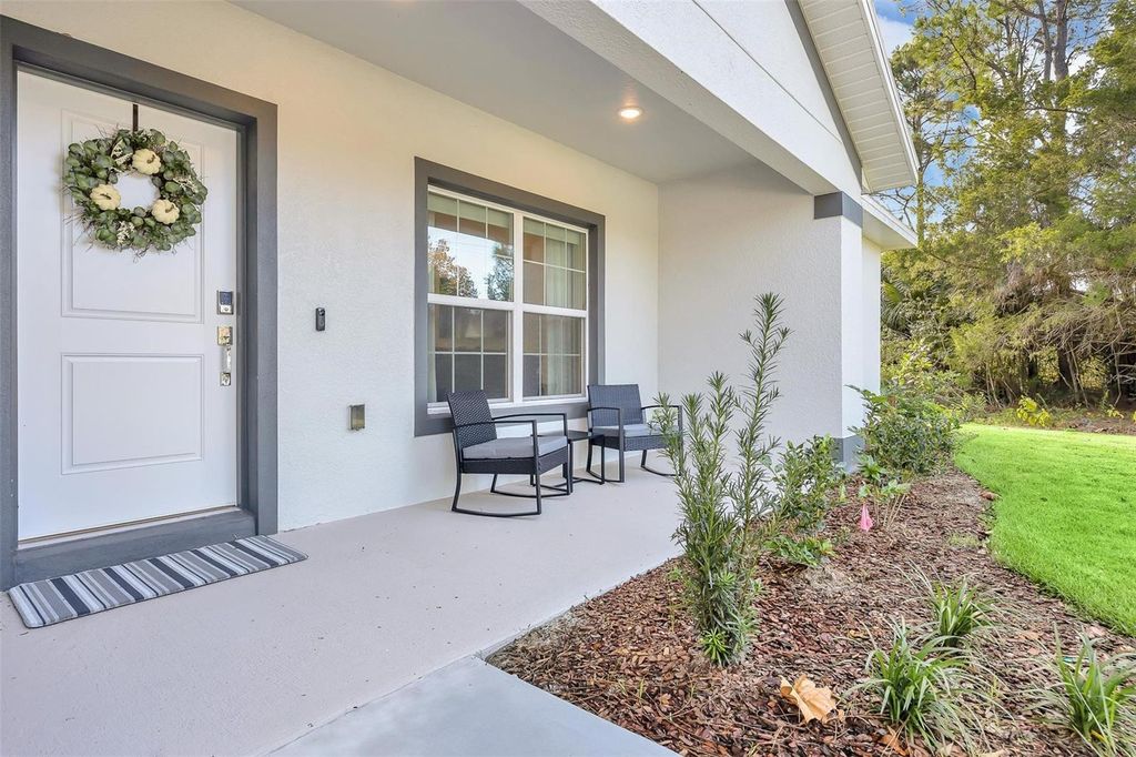 Photo of 56 White Feather Lane, Palm Coast, FL 32164 (MLS # FC317612)