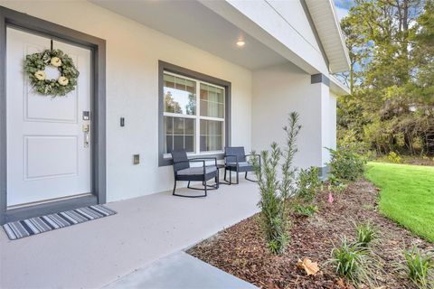 56 WHITE FEATHER LANE PALM COAST FL 32164