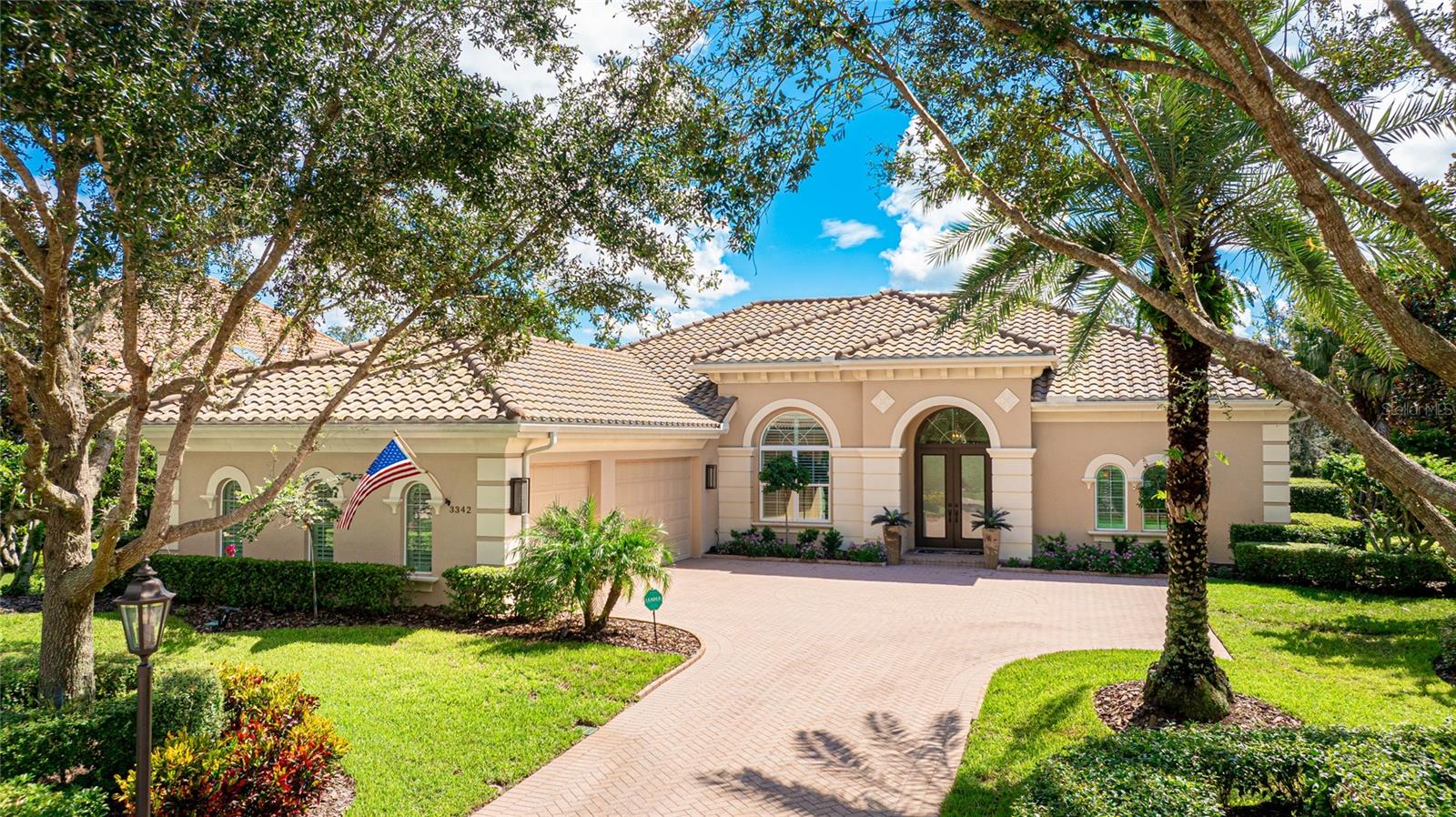 *SELLER NOW OFFERING BONUS INCENTIVE FOR A CLOSING BEFORE JULY 15TH!* Discover Unparalleled Luxury in The Founder's Club
Step into refined elegance with this impeccably maintained single-family residence, nestled within the prestigious, gated enclave of The Founder's Club. Built in 2014 by renowned luxury homebuilder London Bay Homes, this exquisite Isabella model offers a rare blend of architectural sophistication, serene surroundings, and modern comfort—all just minutes from Sarasota’s finest beaches, restaurants, shopping, and cultural venues.
Set on a peaceful, lushly landscaped lot, the home spans over 2,800 square feet of thoughtfully designed living space, featuring 3 spacious bedrooms and 3 full bathrooms—perfectly suited for both relaxed daily living and effortless entertaining. The chef’s kitchen is a culinary masterpiece, complete with top-tier Thermador appliances, rich wood cabinetry, and elegant stone countertops. Two distinct dining spaces invite both casual meals and formal gatherings, while the expansive living room opens seamlessly to the screened lanai—creating the ultimate indoor-outdoor lifestyle.
At the rear of the home, a tranquil flex room provides ideal space for a home office, creative studio, or playroom. Step outside to your own private retreat: a resort-style lanai with a fully equipped outdoor kitchen and a sparkling pool, ideal for both relaxing afternoons and lively entertaining. The large, fully fenced backyard offers privacy and security—perfect for children or pets.
Additional highlights include an oversized three-car garage with a climate-controlled storage room, a brand-new hot water heater, and a whole-house generator—delivering peace of mind and year-round comfort. Mediterranean-inspired architecture, a paver driveway, and meticulously manicured landscaping complete the home’s stately curb appeal. Flooded with natural light and maintained to perfection, this home exudes timeless charm and enduring quality.
Take a closer look through the immersive Matterport tour and aerial video: https://my.matterport.com/show/?m=LMpCnoSKyCk
As one of Sarasota’s most coveted communities, The Founder's Club offers world-class amenities including a championship golf course, elegant clubhouse, fitness center, tennis and pickleball courts, and a vibrant social calendar. Ideally located just 15 minutes from both Downtown Sarasota and Lakewood Ranch, and only 25 minutes from the white sands of Lido Beach and the boutiques of St. Armand’s Circle.
This is more than a home—it’s a lifestyle. Don’t miss the opportunity to make this exceptional property yours.