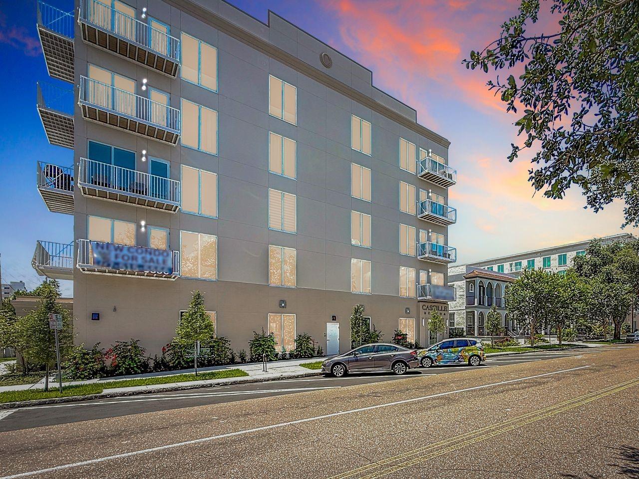 Beautiful, BRAND NEW WATER VIEW CONDO - MOVE-IN Ready - Better than NEW! On WARRANTY! Discover pure LUXURY and Comfort in this exquisite, light-filled 5rd floor condo, located in downtown St. Pete's new Castille Urbana building. Could be Turn-key! Live within WALKING distance of urban and vibrant attractions, while savoring the tranquility of a peaceful neighborhood, with ample on-street parking for your guests with not only museums, theaters, art galleries, JOHN HOPKINS hospital, USF, Tropicana field, Publix, over 50+ award-winning restaurants, you'll also have easy access to scenic cycling and pedestrian trails, nature preserves, St. Pete Pier and Award Winning Beaches. Imagine everything you could want, all within walking distance! And now: Step into your brand new penthouse condo - 5th floor (no above neighbors), where a feeling of openness and grandeur envelops you with soaring 10' ceilings and an abundance of NATURAL LIGHT. Meticulously maintained, this home caters to your every desire. You can entertain effortlessly in this open living room. BRIGHT kitchen, and spacious dining area, all providing ample space for making cherished memories while hosting with ease. The kitchen is a chef's DREAM, equipped with top-of-the-line stainless steel BOSCH appliances, including a convection oven. GORGEOUS pendant lighting hangs above the LARGE kitchen island, with space for in-kitchen dining. Elegant shaker cabinets provide ample storage, and QUARTZ countertops with well-placed task lighting provide ample prep space. For a quiet night in, you can sip a glass of wine on the BALCONY while taking in a mesmerizing SUNSET and enjoying gorgeous Water Views of our Bay. This home has two generously sized bedrooms, ensuring you have plenty of space for a good night's sleep. Spacious WALK-IN closet, linen closet, and en-suite bathroom provide both luxury and functionality. Additional storage closet can serve as the gym or plethora of extra space. You can indulge in the spa-like en-suite, featuring an oversized shower adorned with Carraca MARBLE tiles, a spacious DOUBLE vanity with brushed-nickel features, exquisite quartz countertops, & double fogless touch-light mirrors. The guest bedroom, located on the opposite side of the home for maximum PRIVACY, also boasts a sizable walk-in closet. Convenience meets luxury with a generously sized laundry room with ample storage space and conveying washer and dryer, strategically tucked away near the front door plus another Extra storage space/closet. Beautiful wide-plank engineered hardwood flow throughout the home. This smoke-free condo boasts hurricane-rated, UVA-filtering windows and doors, along with fob-entry doors and gated parking to ensure you feel secure at home. Your furry friends are not forgotten! A dedicated DOG-RUN located conveniently in the garage allows your PET to play freely, & a dog-washing station helps keep them clean and pampered. Gym/Community room + Modern elevators allow you to effortlessly take groceries and packages to the 5th floor. An EV charging station can be available for your vehicle via Duke Energy. I-75 is just around the corner, giving you easy access to the entire Tampa-Bay area. Don't miss this opportunity to elevate your lifestyle to new heights. Brand New Castille Urbana building is not just a place to live, but a lifestyle you'll LOVE! Experience the epitome of modern, convenient, and luxurious living in this elegant St. Pete condo!