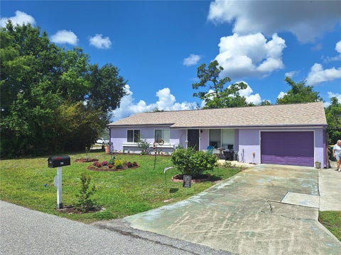 Photo of 402 Cicero Street NW, Port Charlotte, FL 33948 (MLS # W7886050)