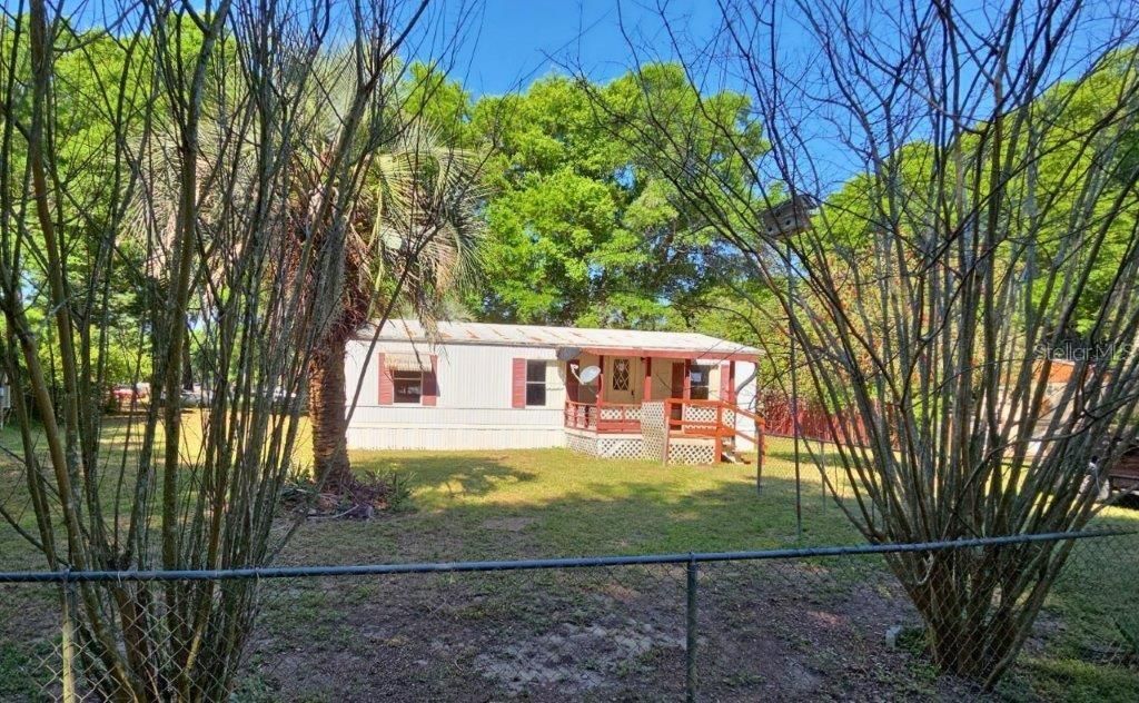 Photo of 12960 SE 109th Terrace, Belleview, FL 34420 (MLS # O6397418)