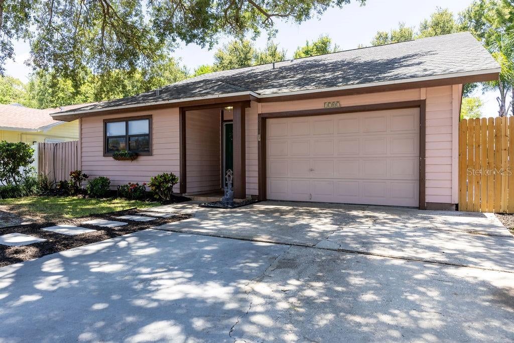 Photo of 1707 Whispering Drive E, Largo, FL 33771 (MLS # O6419011)