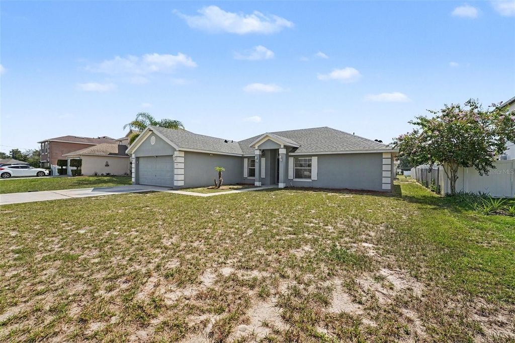 Photo of 1714 Pilchard Drive, Poinciana, FL 34759 (MLS # O6428245)