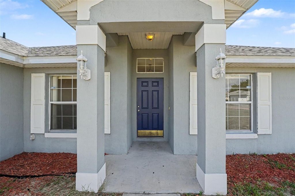 Photo of 1714 Pilchard Drive, Poinciana, FL 34759 (MLS # O6428245)