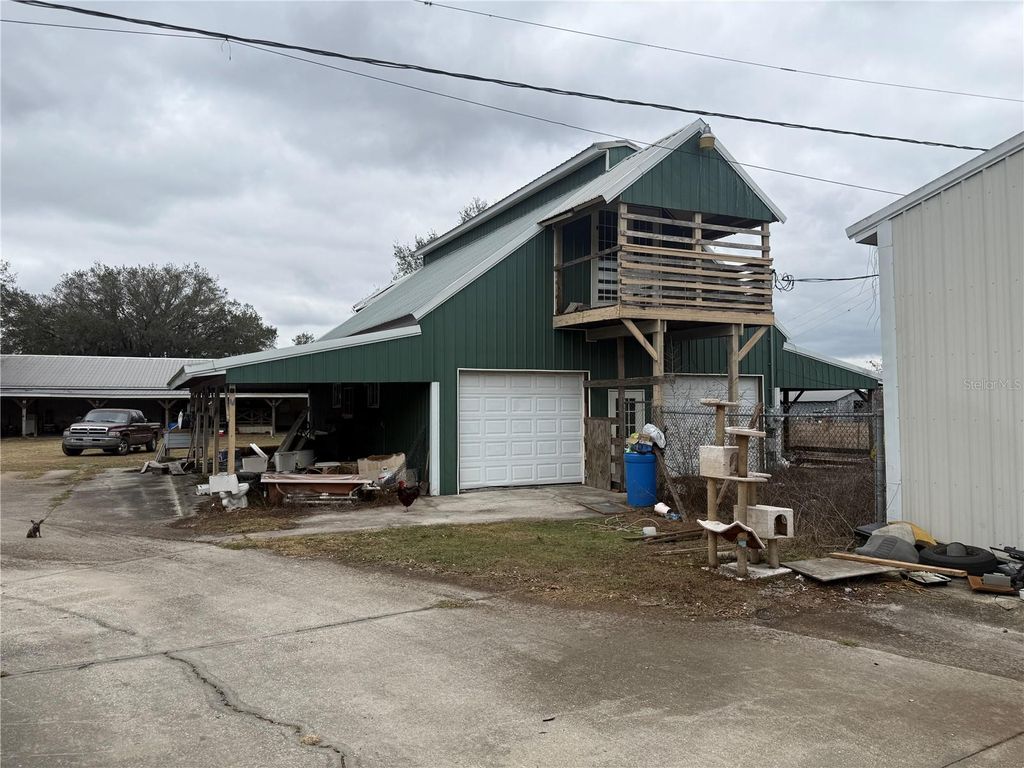 Photo of 3970 E Knights Griffin Road, Plant City, FL 33565 (MLS # TB8476640)