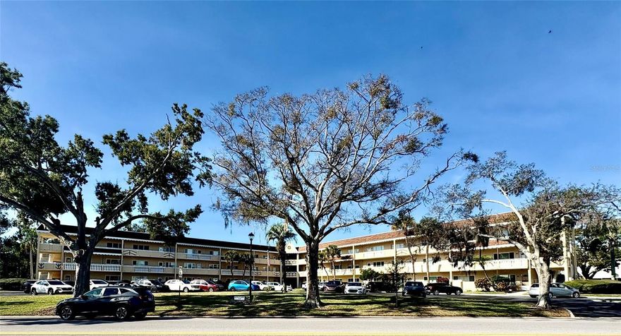 Imagine waking up every day feeling like you're on vacation!!! Welcome home to this move-in-ready, light and bright condominium offering true resort-style living on the peaceful 3rd floor with fresh breezes & no one above you! It is ideally located just steps from the main Activity Center and sparkling swimming pool, and so many more activities right at your fingertips! As you walk through the front door, you'll immediately appreciate the fresh, neutral paint & baseboards and brand-new neutral carpeting throughout. Recent updates include a new front door and storm door, all new electrical outlets and switches, new window screens, and new toilets, providing comfort, convenience, and peace of mind. Whether you're searching for a full-time residence, seasonal retreat, or your own slice of paradise, this Gulf Coast Florida gem puts you close to some of the world's most beautiful beaches and an unbeatable lifestyle. Assigned parking. The 55+ community has two activity centers, and two private golf courses with 9 and 18 holes, free exclusively for resident owners. There are two heated swimming pools.  The remodeled Cardio Gym has the latest exercise equipment. A very pet-friendly community, there is a fenced dog park with covered seating. There are hobby studios, and a wood shop for the exclusive use of the residents. Activities include fitness classes, dancing, clubs, cards, billiards, entertainment, classes, and much more. The on-site Good Karma Café has take & bake meals and snacks. Close to beaches, transportation, shopping, entertainment, and fine dining. All room sizes, floor plans and square footage are approximate. This property is being transferred by a leasehold estate deed. Association approval is required. If financing, a 35% down payment is required.