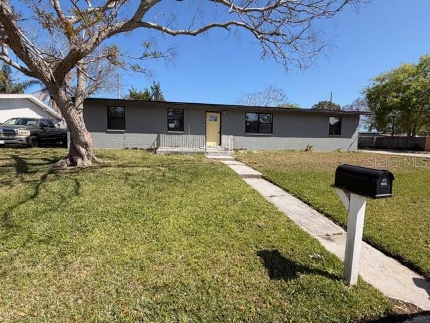 Seller is excepting highest and best offer until 3/23/2026 by 2PM

Come see this 3 bedroom 3 bathroom home in the heart of Daytona - just minutes from shopping and the beach! This home boasts nearly 1,300 square feet of under air living space AND a separate 700 sqft garage/workspace complete with car lift and full bathroom! This space is perfect for the car enthusiast and a great way to store all of your toys! It includes an exhaust fan, overhead electrical connections, and 220 and 110 connections on both sides. Upon entry to this home, you are greeted with an open living space, classic terrazzo flooring,  and large windows allowing natural light and front yard views.