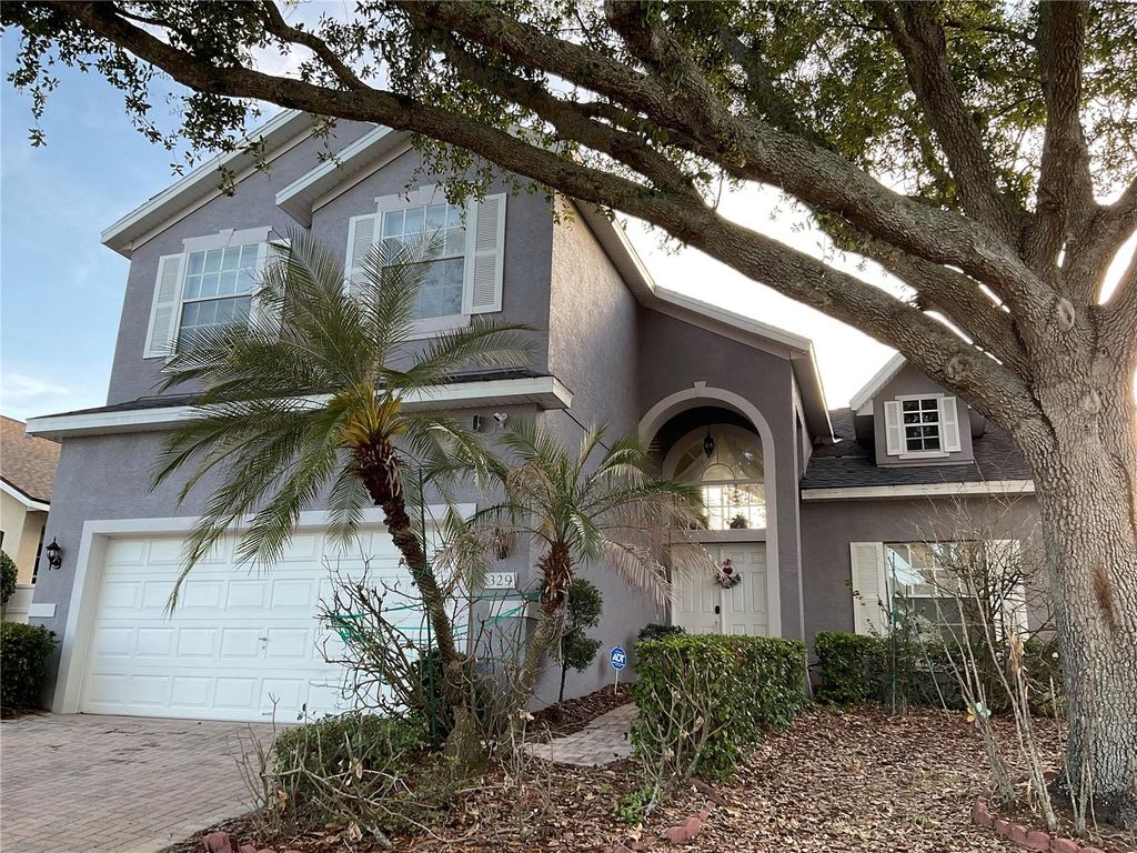 Photo of 329 Windsor Pi Pl, Davenport, FL 33896 (MLS # O6406444)
