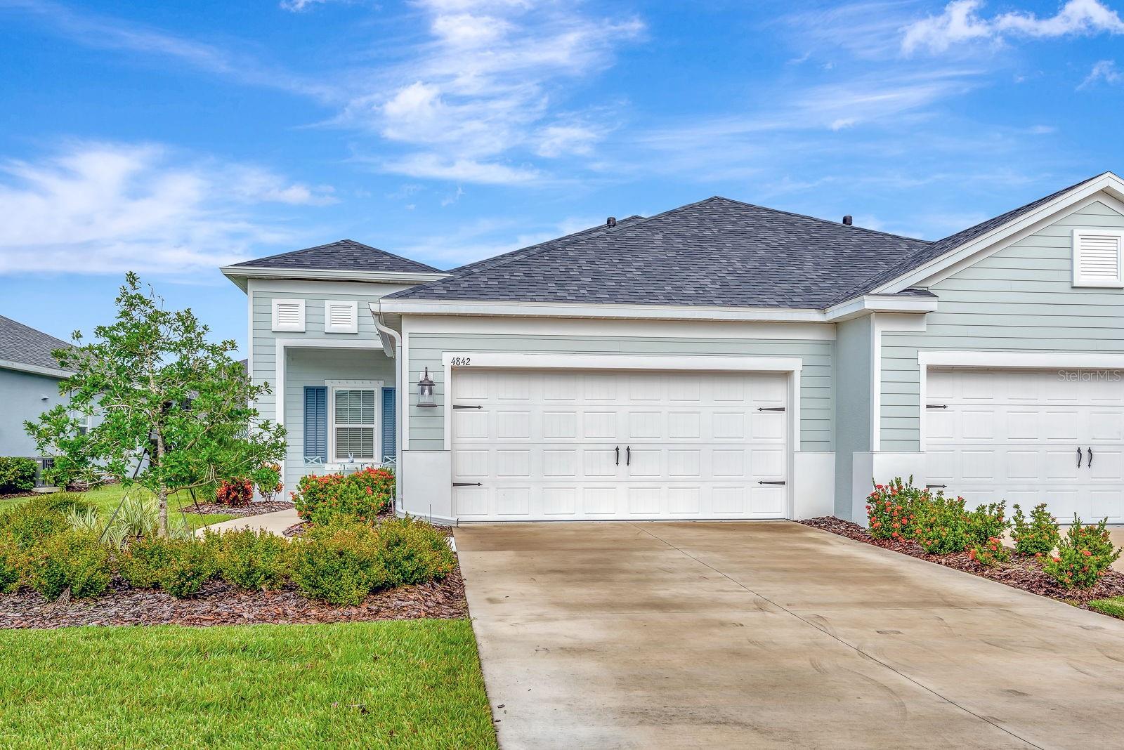 Welcome to one of the most desirable villa models in the sought-after Canoe Creek community. This 2-bedroom + den home is only two years old and showcases premium upgrades throughout, including luxury vinyl plank flooring, soaring ceilings, quartz countertops, an oversized kitchen island, and an epoxy-coated garage floor. Designed with both style and function, this villa also features smart home technology and carefully selected finishes that make it truly move-in ready. As a Canoe Creek resident, you’ll enjoy resort-style amenities such as a private villa pool and spa, clubhouse with outdoor kitchen, state-of-the-art fitness center, year-round social events, and more. The community is beautifully maintained, offering the perfect balance of comfort and luxury. Located in the rapidly growing Parrish area near Lakewood Ranch, this home provides easy access to St. Petersburg, Sarasota, and Tampa – all within a short drive. If you’re searching for a modern villa in a vibrant, amenity-rich community, this is the one to see.