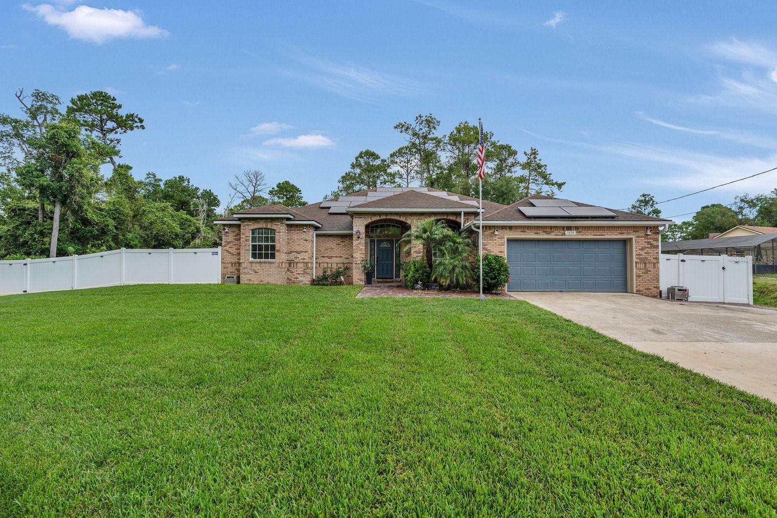 COME CHECK OUT THIS RARE GEM!!! Tranquil Fountain Pond with Bluegill and Lush Landscape with Canopy of Trees on a Beautiful Brick Corner Lot Sets the Scene for This Rare Deltona Lakes Retreat! Situated on just under an acre, this meticulously maintained 3-bedroom, 2-bath home offers a peaceful, private oasis unlike any other in the area. A full solar system paid off at closing ensures effortless, energy-efficient living in this highly sought-after neighborhood where homes rarely come on the market. Inside, enjoy over 2,100 sq ft of open living space featuring soaring ceilings, tile floors, and abundant natural light streaming through double pane tinted windows (2020). The spacious kitchen shines with granite countertops, hardwood cabinetry, stainless steel appliances, a center island, bar seating, and a stylish backsplash, perfect for both casual meals and entertaining. Elegant formal living and dining rooms flow seamlessly into a cozy family room anchored by a brick fireplace, creating inviting spaces for relaxing or hosting guests. The luxurious primary suite offers direct pool access, a spa-like bath with garden tub, walk-in shower, dual vanities, and a massive walk-in closet. Step outside to your private outdoor haven, the heated saltwater pool invites memorable gatherings, while the lush, fully fenced backyard features a modern irrigation system and fresh sod (2024). Enjoy peaceful moments by the front-yard pond stocked with bluegill, refresh under the covered patio with ceiling fans, or take advantage of the newly installed pavers and a 20x20 pole barn (2025) for additional outdoor living or storage space.
Upgrades include a roof, A/C, and water heater replaced in 2018, double pane tinted windows (2020), and the freedom of no HOA, giving you peace of mind and flexibility. This home is truly one of a kind!!! A rare find in an area where homes seldom come on the market. Opportunities like this don’t come around often, so don’t miss your chance to own a piece of this tranquil, natural paradise. Living here means more than just a house, it’s a lifestyle of tranquility, comfort, and natural beauty. Schedule your private tour today and experience this exceptional Deltona Lakes home for yourself. It is conveniently located near grocery stores, retail, medical services, restaurants, and Stetson University. Area beaches are approximately a 30-minute drive. Easy access to the I-4 Corridor and SR 415.
