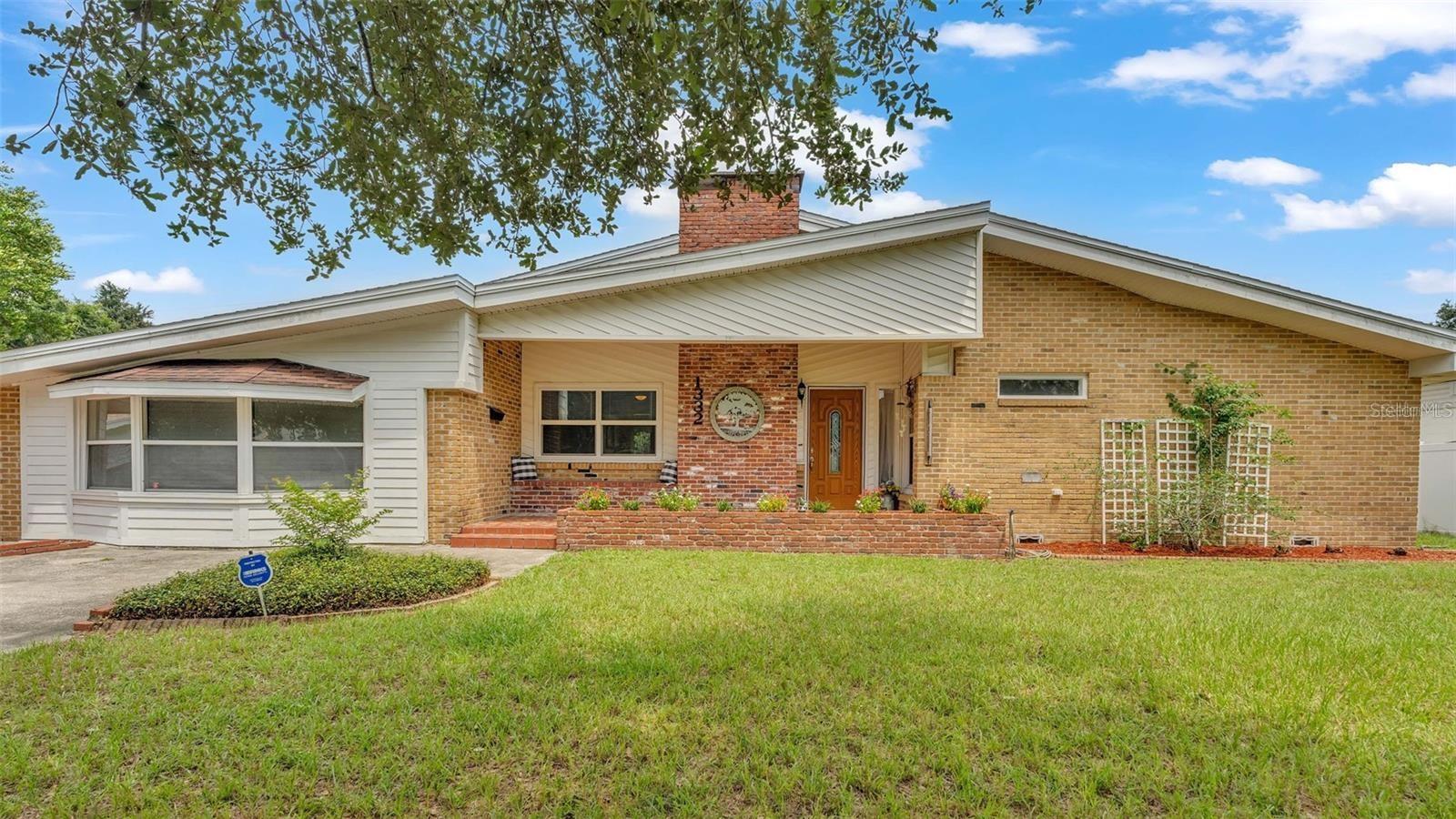 You don’t want to miss seeing this adorable 4/2 home with all its charm centrally located and NO HOA! From the start your lovely front entry patio area offers a spectacular built-in seating bench. Walk into the home and you’ll be in awe of the living space centrally located in the home incorporated with a gorgeous wood burning fireplace and the beautiful wood flooring. The kitchen is a chef’s dream offering tons of countertop space for preparing, serving & entertaining. You’ll love the large island with electric, seating area, beautiful granite countertops, multiple pantries, tons of cabinets, soft close drawers, recessed and globe lighting, tile backsplash, 3 windows and your door to your back patio area w/ a window giving lots of natural lighting & more! Hall bath offers a tub & tiled shower combo. The main bedroom/bathroom offers a beautifully tiled shower stall with sliding doors, a pedestal sink and wainscoting coating decorative wall. The main bedroom has recessed lighting, and a walk-in closet w/ built in shelving. You have a nice dining room offering decorative crown molding and sliding glass doors taking you to the open/paved back patio area, which is perfect for entertaining, enjoying the outdoors, BBQ’s and more. This room could be used as a bonus room having the space in the kitchen for dinette space or split for dining & sitting area space. Lots of options here! The Bonus Room is located off the kitchen offering multiple uses so be sure to bring your ideas along with you. This beautiful home boosts tons of windows for natural lighting, ceiling fans & window treatments throughout. NO carpet in the home. Bedroom 4 screams cozy from the character of the paneling & wood flooring. The home has multiple closets with shelving in the hallway perfect for storage & linens. This home has so much character with the original wood flooring you have got to see it for yourself! Back yard only needs one side of fencing to be fully fenced-in and offers a storage shed. WIFI thermostat, A/C replaced 8/2021, New Rheem Hot Water Heater 2022, some electrical upgrading including updated electrical panel 2013, Roof permit 2008, Windows-many newer double pane windows replaced 6-7 yrs ago. Inside utility area in bonus room. Location location location! The home backs up to the Lake Bonny Park with baseball fields, soccer fields, walking paths, trails, skate park, playground, & more!!! Be sure to check out the virtual tour link. You do not want to miss this one!