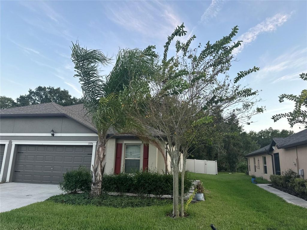 Photo of 13336 Crest Lake Drive, Hudson, FL 34669 (MLS # TB8439641)