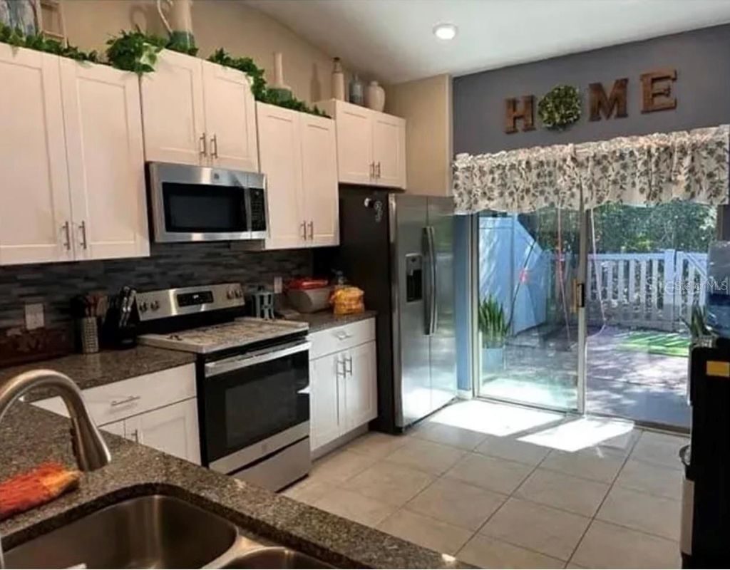 Photo of 13336 Crest Lake Drive, Hudson, FL 34669 (MLS # TB8439641)