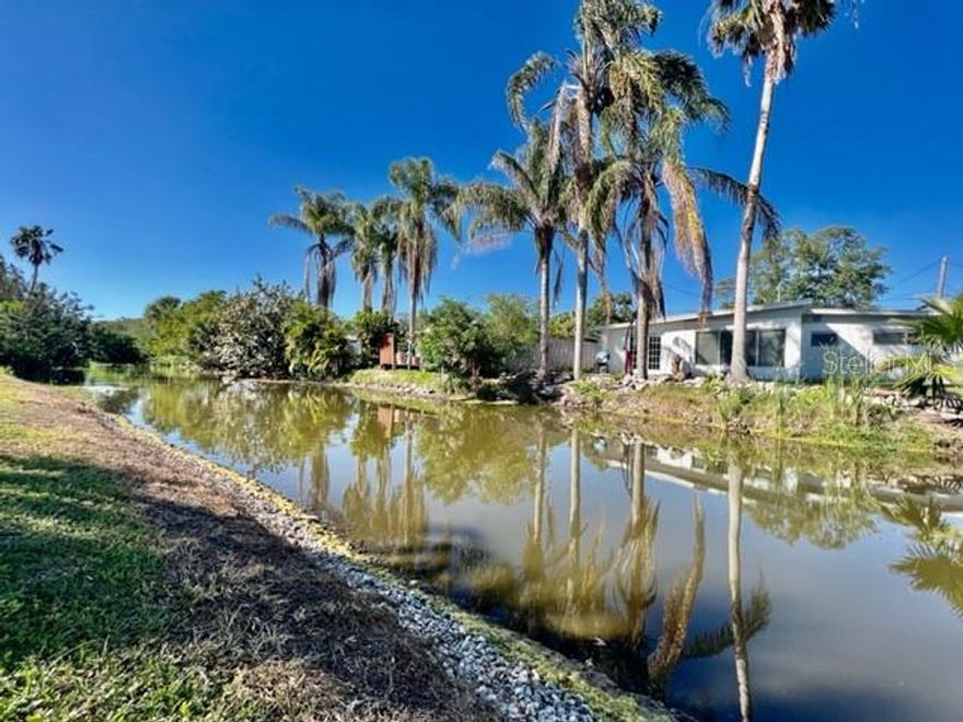 BUILD YOUR DREAM HOME at 5113 Avery Rd, New Port Richey in the SUNNY state of Florida. On this wonderful CORNER LOT with nearly 7,800 sqft & NO HOA within the City of New Port Richey in Pasco County, you can design your SPLENDID OASIS. The dimensions of this RIGHT TRIANGULAR LOT are approximately 138' road frontage, 178' waterfront frontage & 113' along the side perimeter. [Who remembers the Pythagorean Theorem of a^2 + b^2 = c^2 as the dimensions of this land illustrate this theorem?] The property is already CLEARED & READY TO BUILD. HUGE BONUS: Because there was once a residential house on this property (demolition permit is dated 1/2024), there may already be impact fees credited for rebuilding with the City of New Port Richey. There is a power pole nearby so this will make electric connection a breeze. Public water is available too. The sellers have prepped this WONDERFUL piece of property for building by obtaining a recent SURVEY, cleaning up the yard by removing some trees & installing a NICE new mailbox. The SERENE WATERFRONT PROPERTY is peaceful to ENJOY with turtles, birds, fish & crabs calling 5113 Avery Rd their home. There is a concrete seawall on part of the property. Your future house will face south so you can enjoy the setting sun painting the sky in VIBRANT COLORS every evening. Hop on your GOLF CART & CRUISE to downtown New Port Richey featuring FANTASTIC restaurants, taverns, festivals, shopping & professional offices. Sims Park is PHENOMENAL for everyone with a playground, splash pad, walking paths along the river & an outdoor amphitheater. The public boat launch is just a few short minutes away where you can take your boat directly to the Gulf of Mexico or enjoy kayaking down the river. Robert K. Rees Beach Park is about 3.5 miles away! The City of New Port Richey is BUSTLING & THRIVING! Location is IDEAL near schools, beaches, medical plazas, shopping centers, restaurants, places of worship, airport & tourist attractions. MAKE THIS YOUR FUTURE HOME!