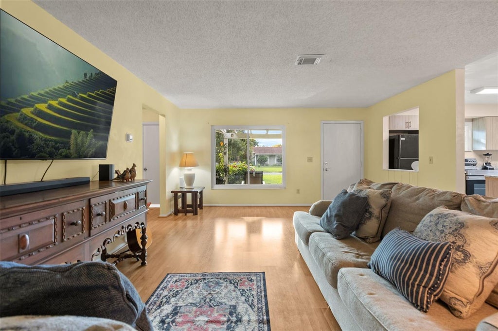 Photo of 10409 Hidden Lane, Orlando, FL 32821 (MLS # O6447070)