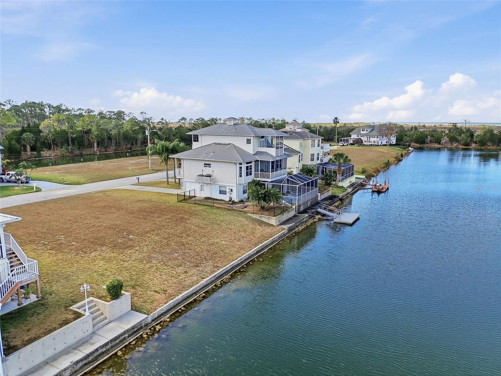 Photo of 3399 Palometa Drive, Hernando Beach, FL 34607 (MLS # W7882499)