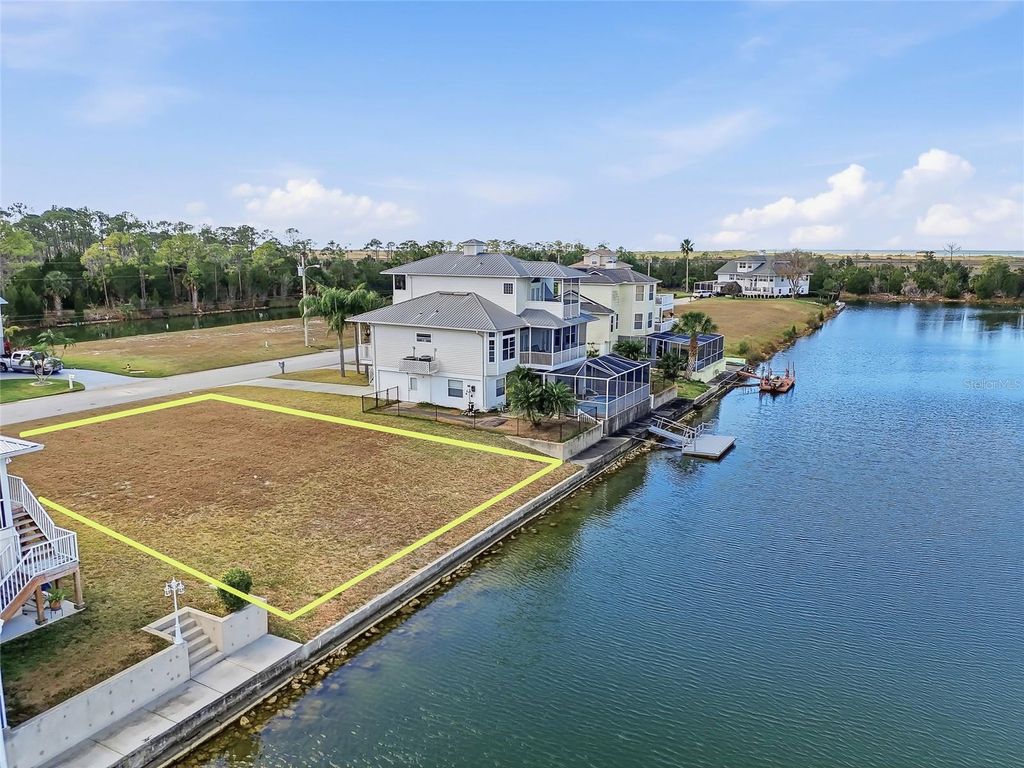 Photo of 3399 Palometa Drive, Hernando Beach, FL 34607 (MLS # W7882499)